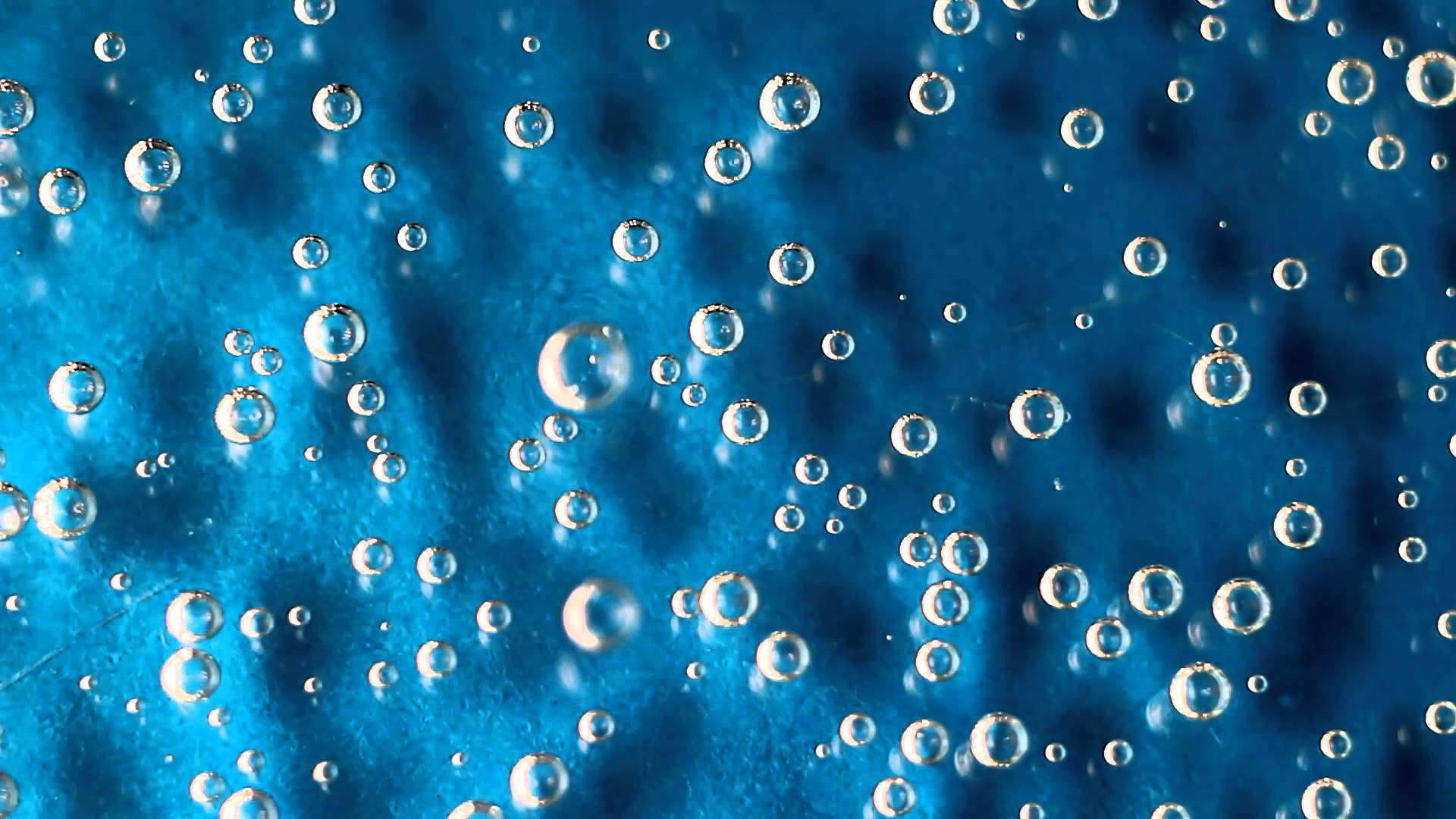 Water bubbles (blue background) stock video.com