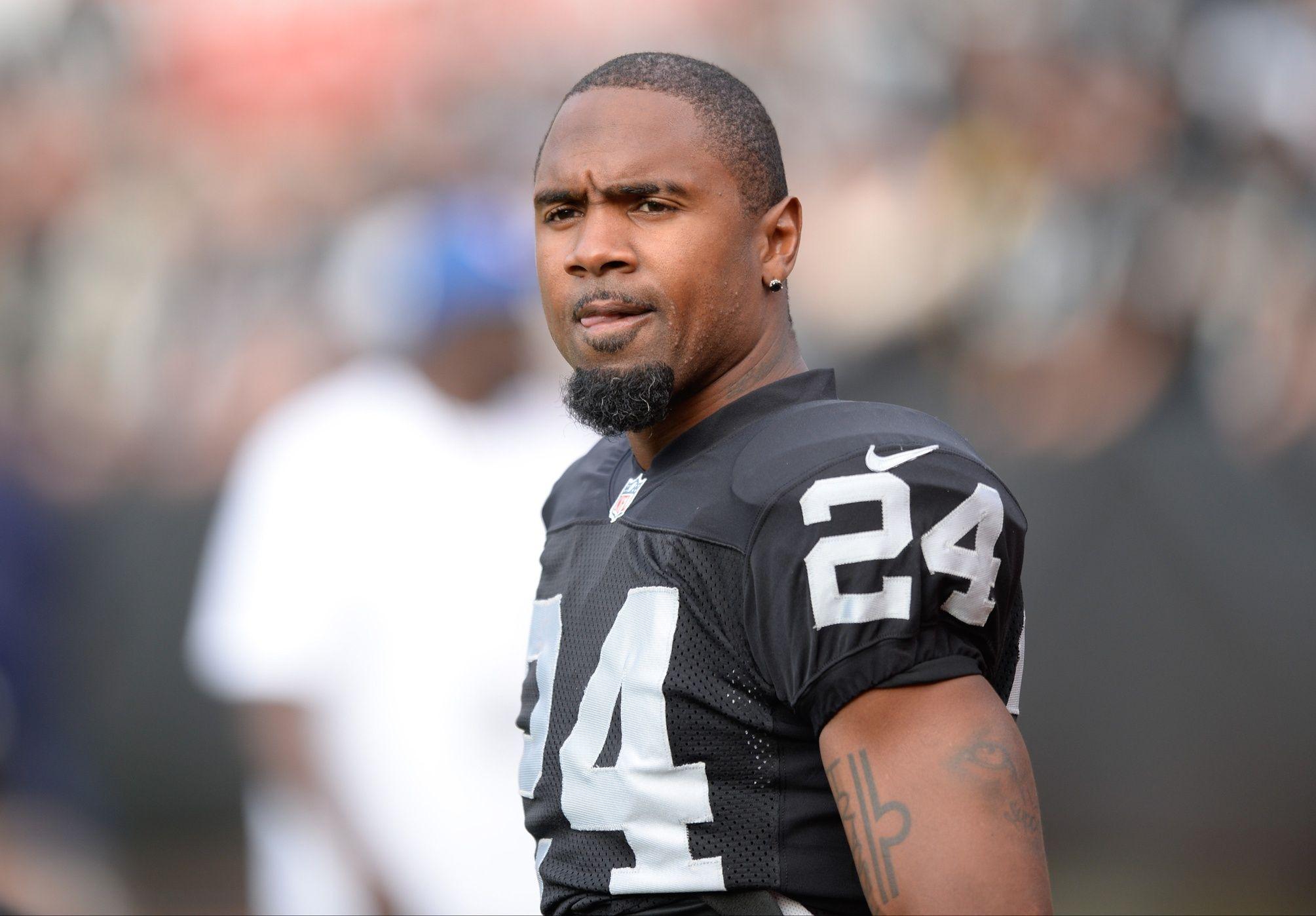 Download wallpaper 2009x1398 charles woodson, oakland raiders