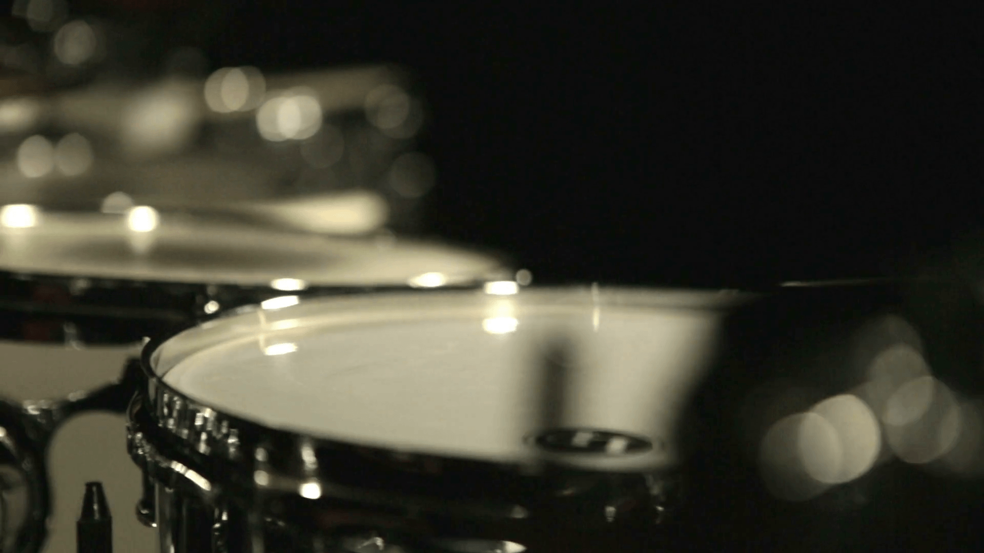 Musical drums kit on black background. Set drums. Close up of white