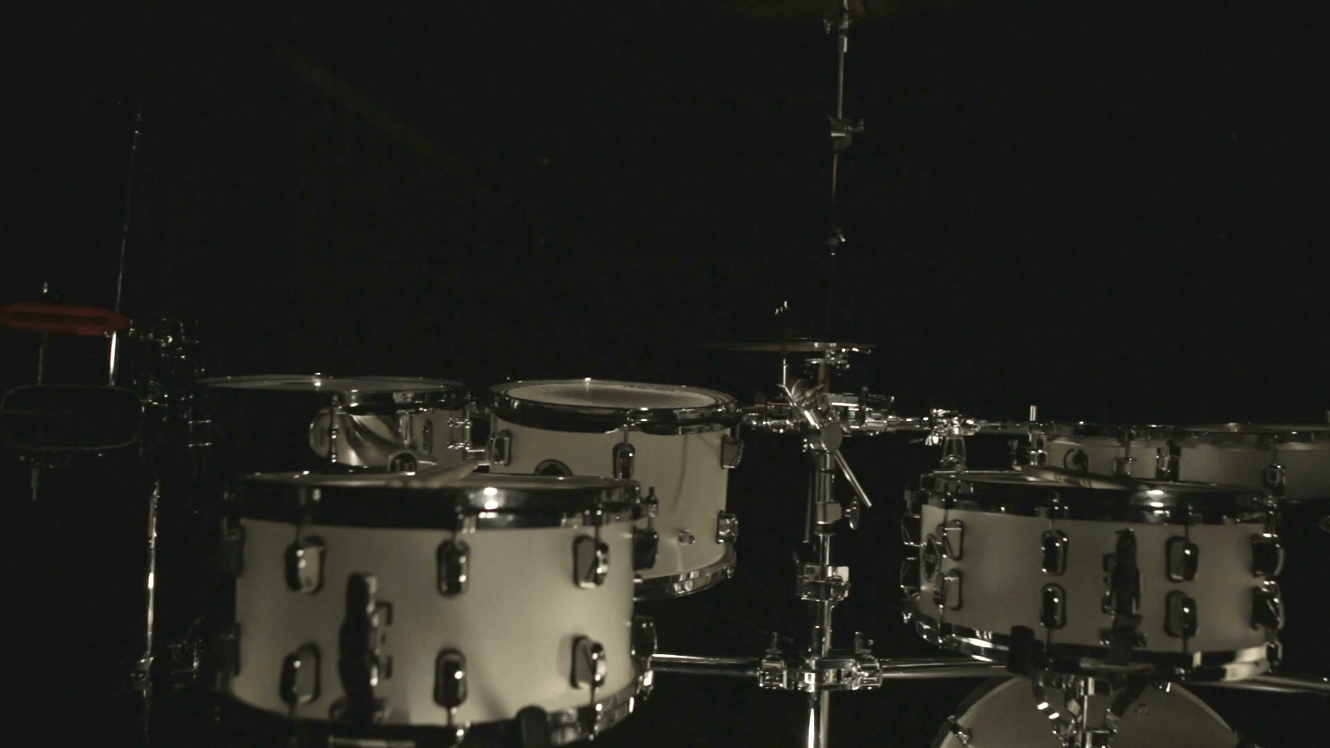 Drum set dark studio. Set drums. White drumset on dark background