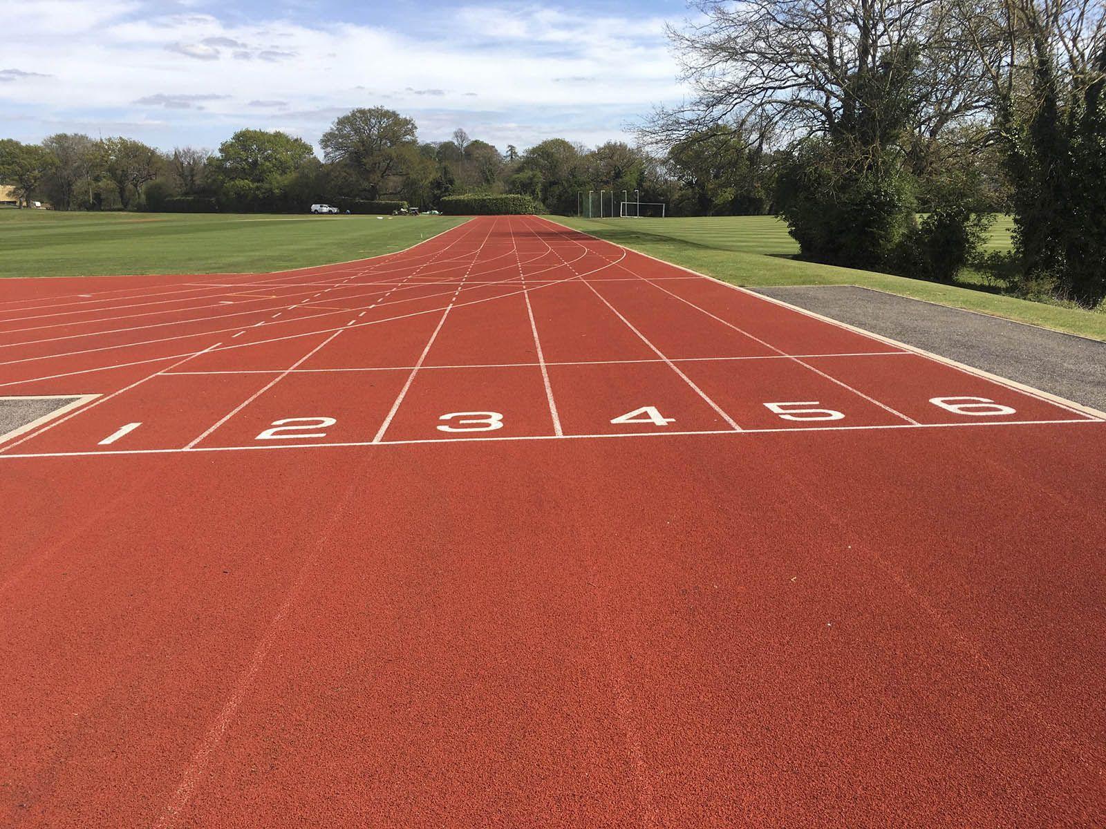 ATHLETICS RUNNING TRACK CLEANING AND MAINTENANCE Grass