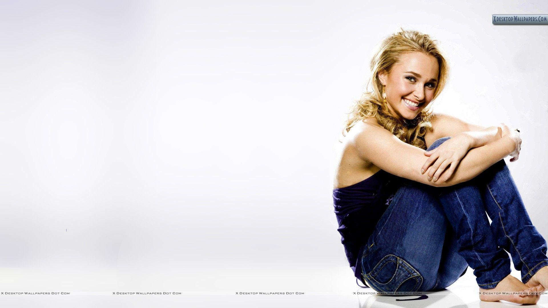 Hayden Panettiere Sitting In Blue Jeans And Top Wallpaper
