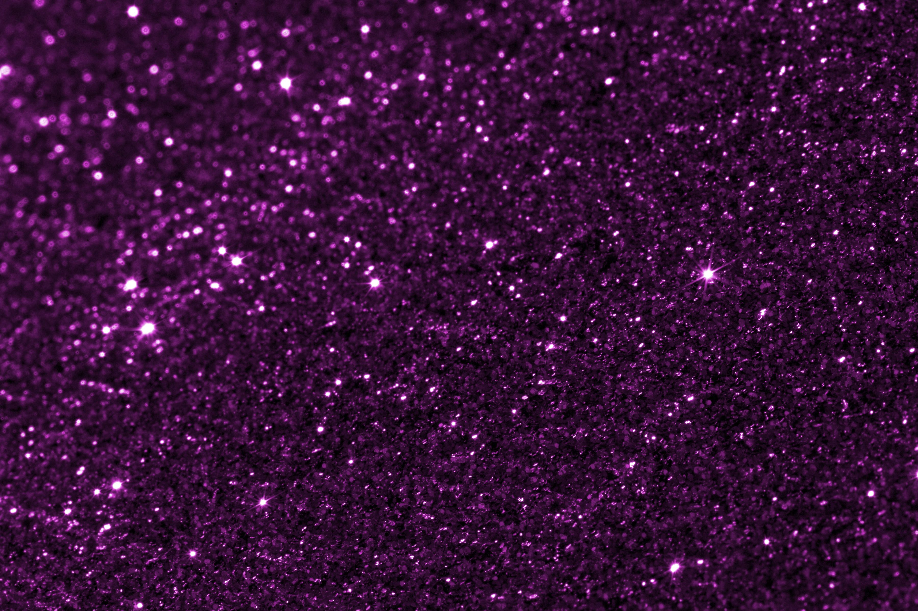 Festive dark purple glitter texture. Free background and textures