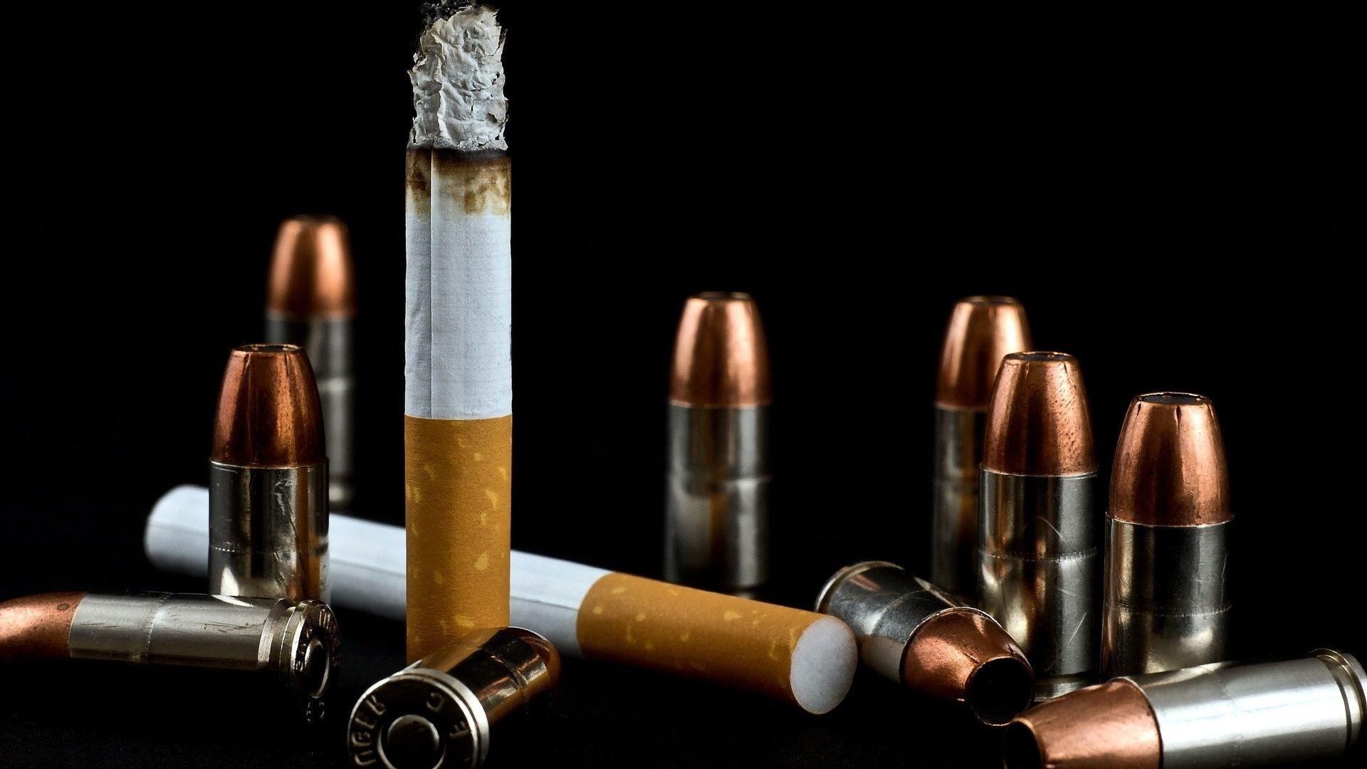 Cigarette and bullets wallpaper