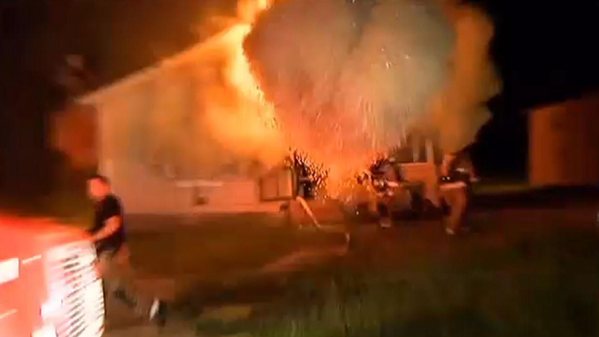 Video: Home explodes in 'backdraft' blast as firefighters enter