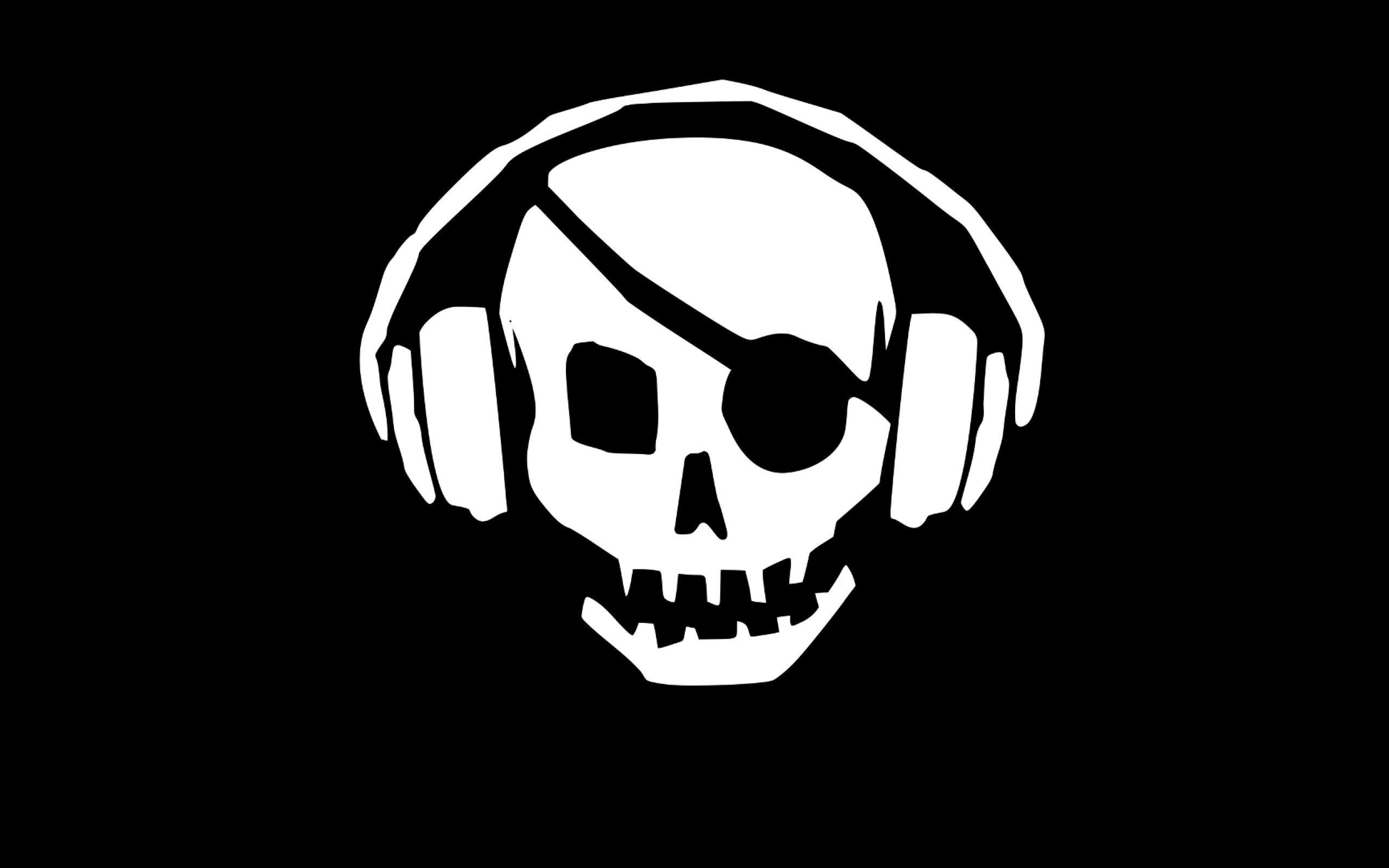 Wallpaper Pirate skull with headphones, black background On