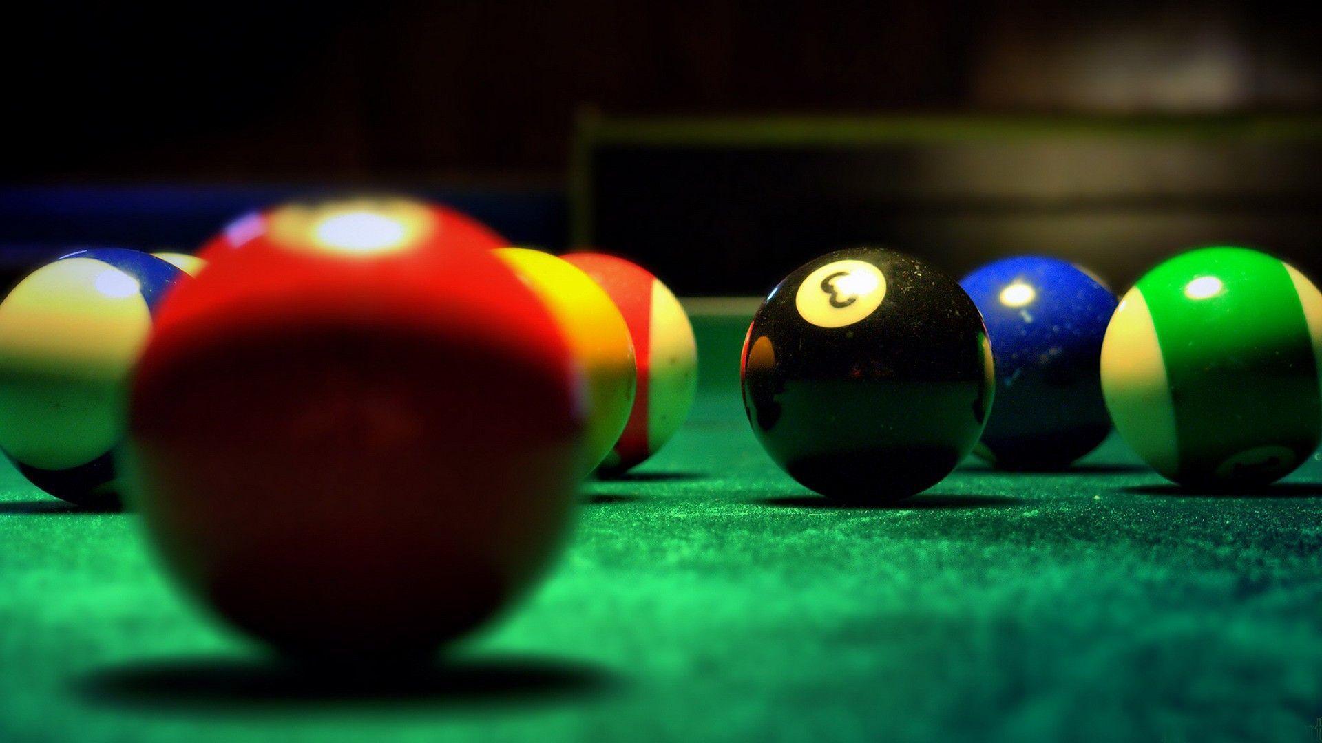 Picture of pool balls. The picture focuses on the black 8 ball