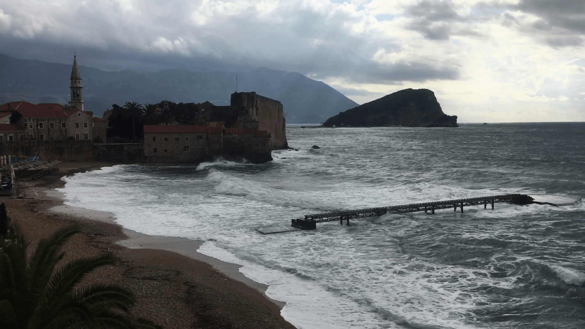 Budva, Montenegro's beach on a stormy afternoon with waves