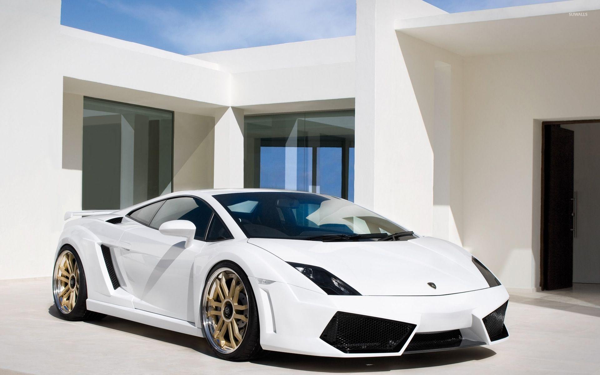 White Lamborghini Gallardo in front of a mansion wallpaper wallpaper