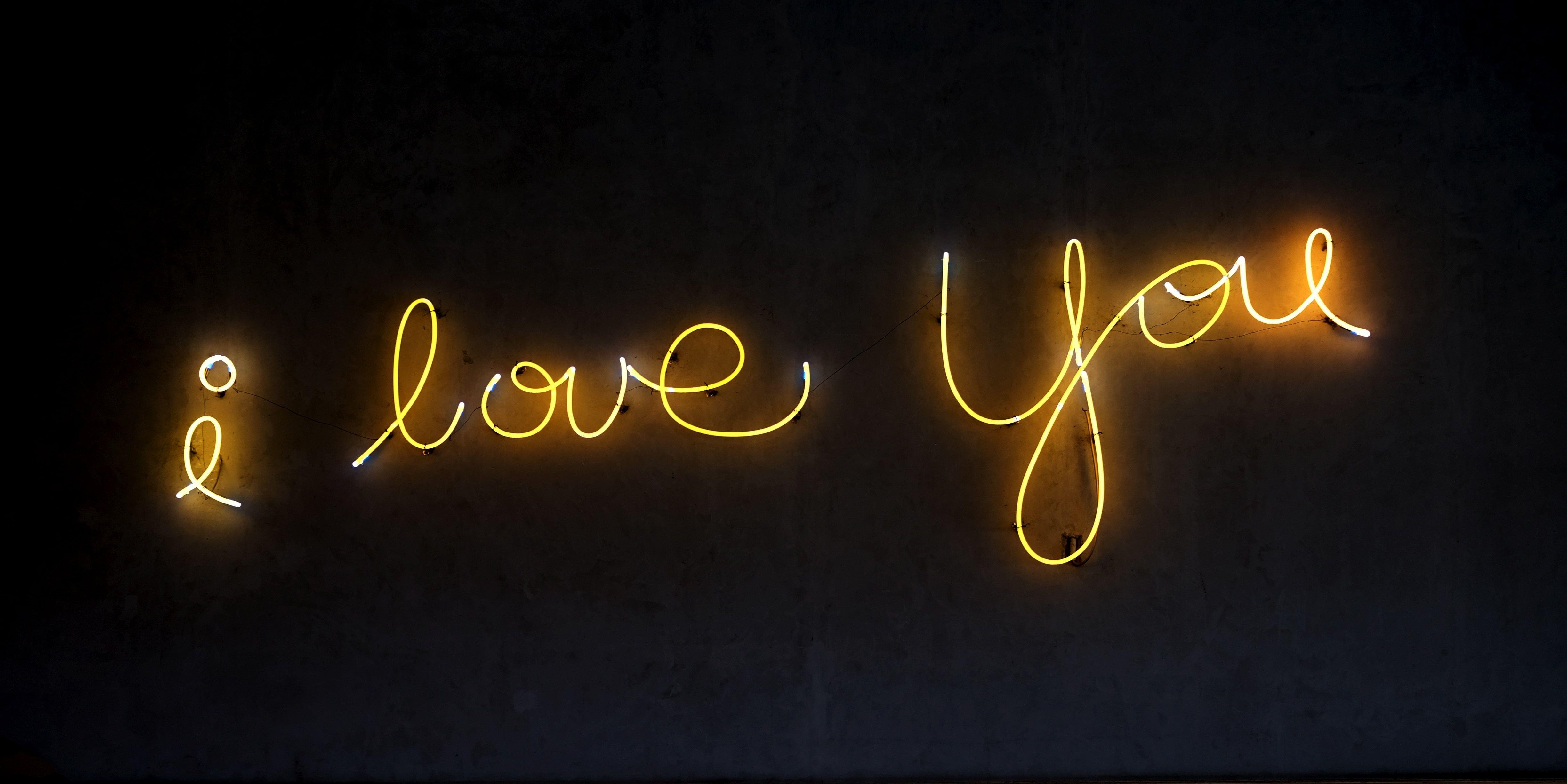 Yellow i love you text on black background HD wallpaper