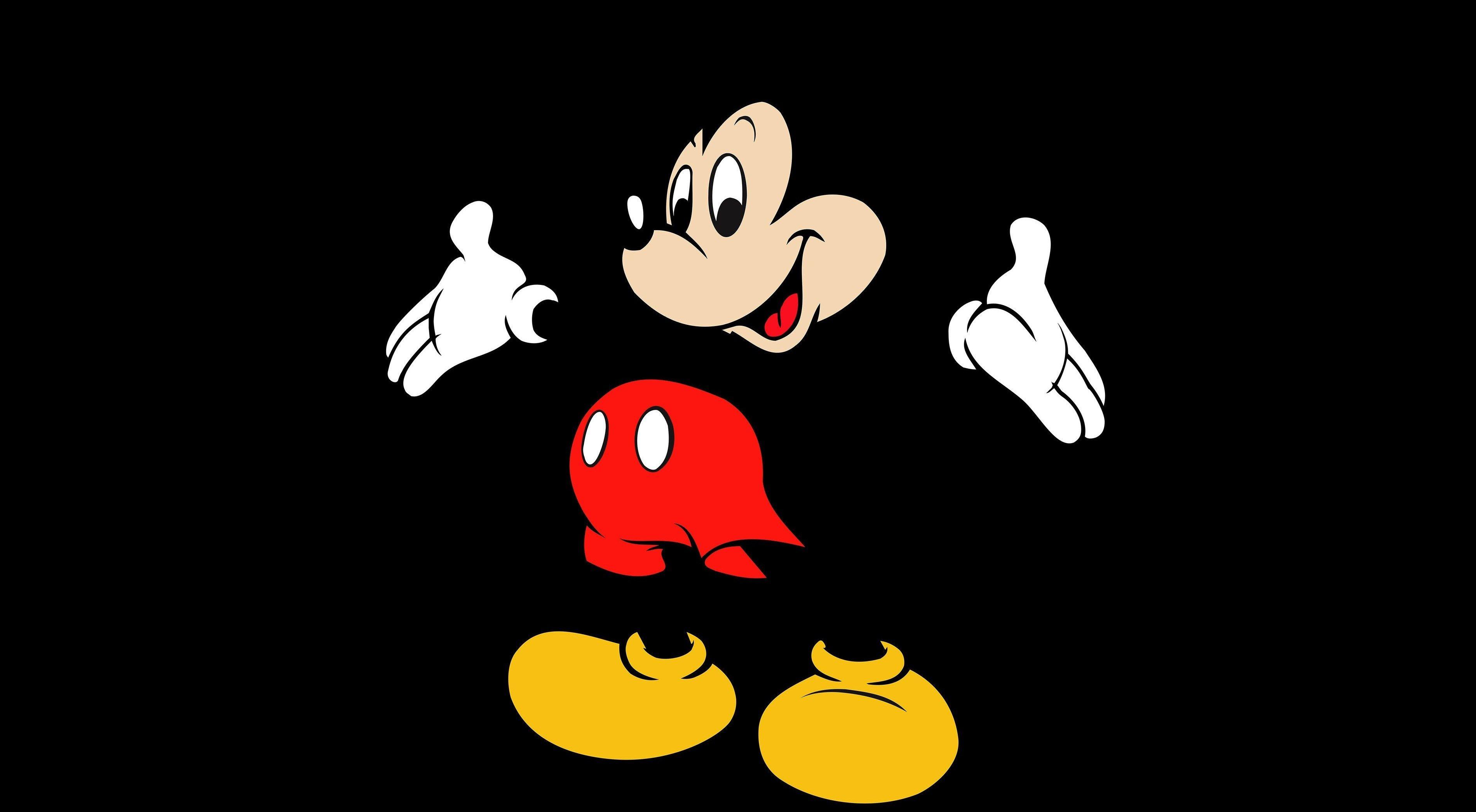 Popular cartoon character Mickey Mouse on a black background