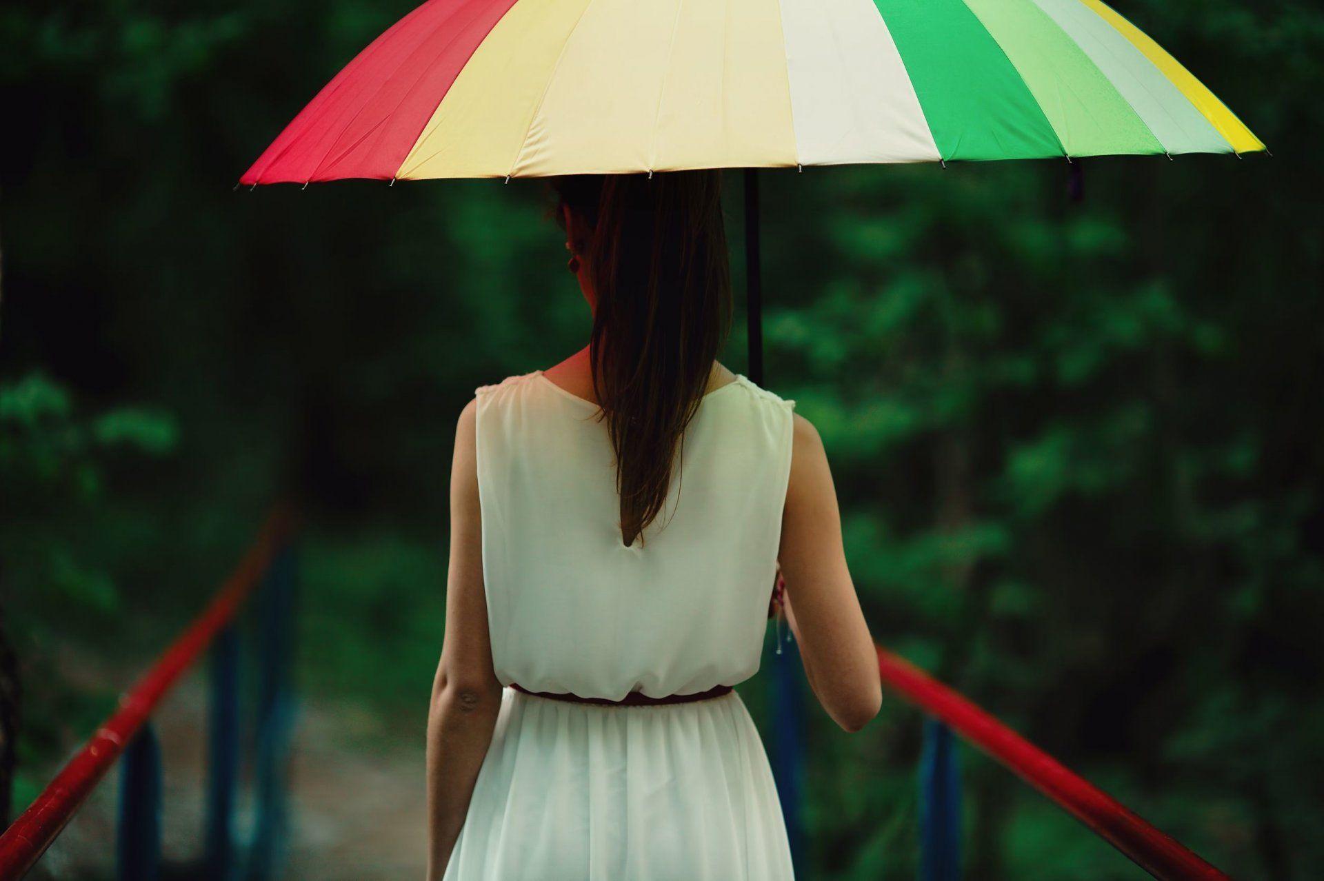 mood girl brunette umbrella color rain weather blur fencing bridge
