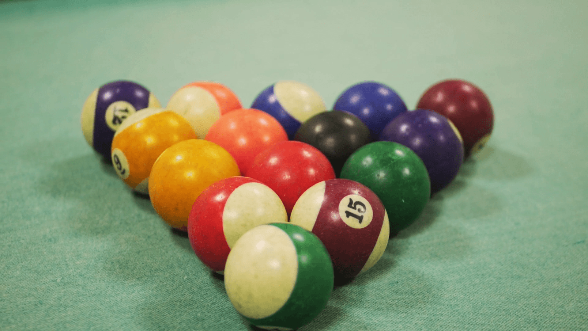 Colorful billiards balls. Billiard ball at green table. Colorful