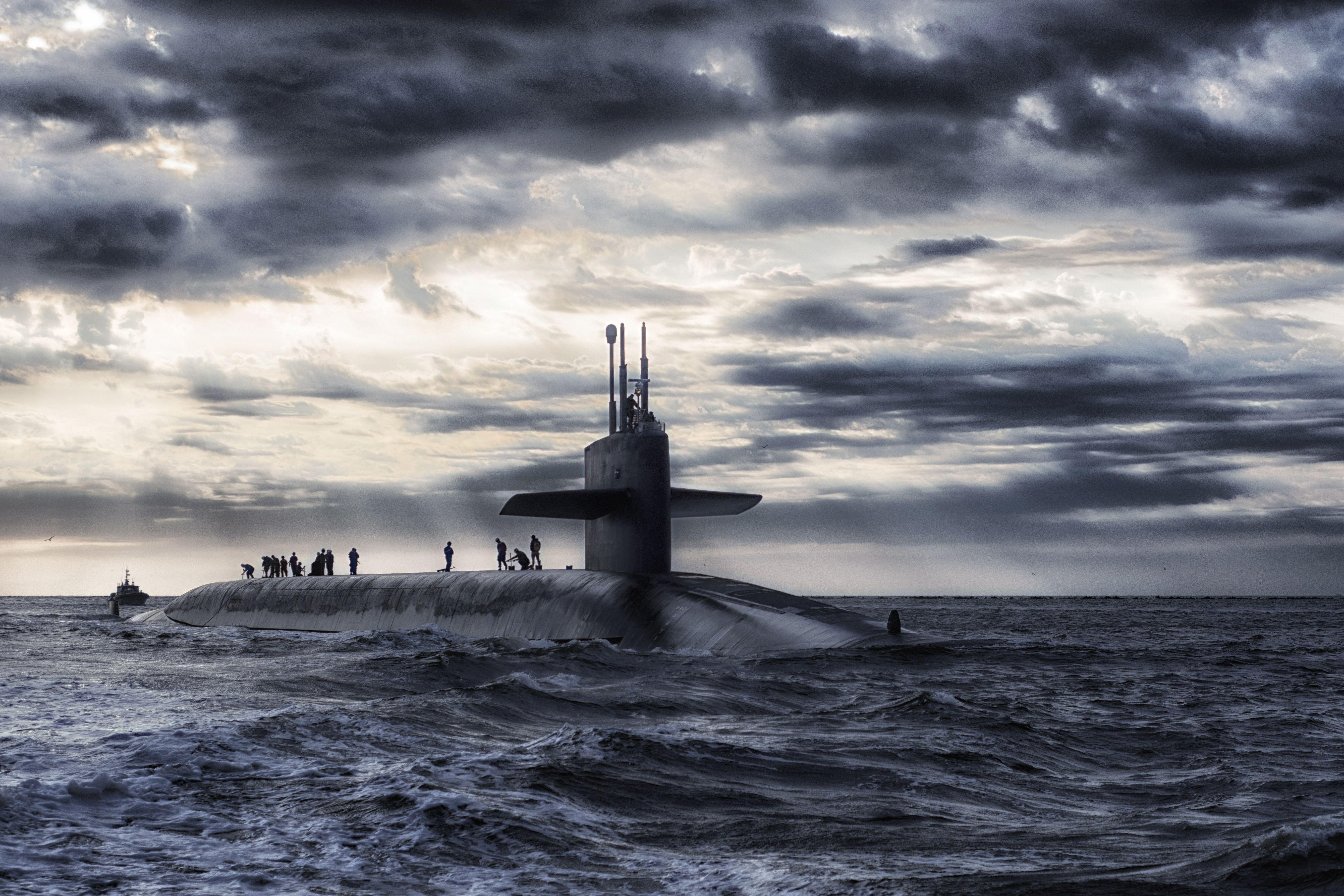 Submarine on the surface of the ocean 5K UHD Wallpaper