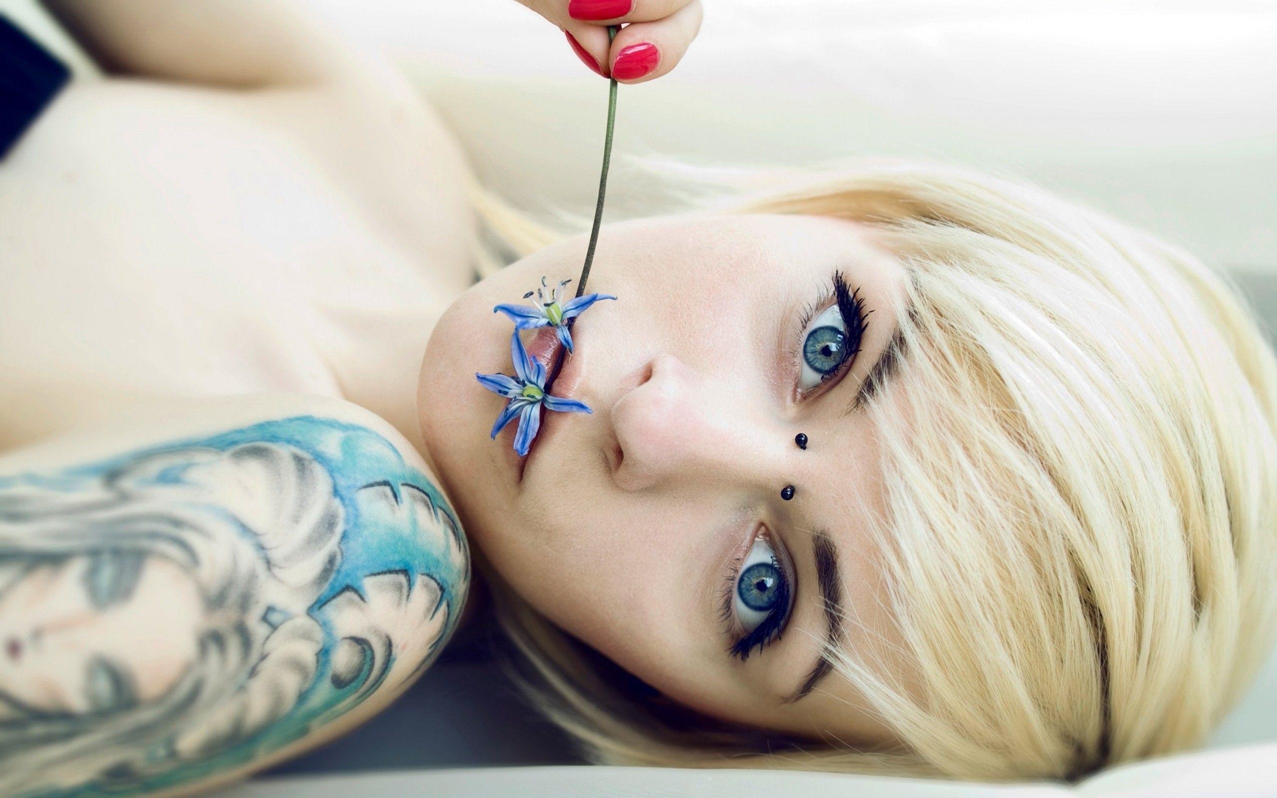 Girl tattoo piercing