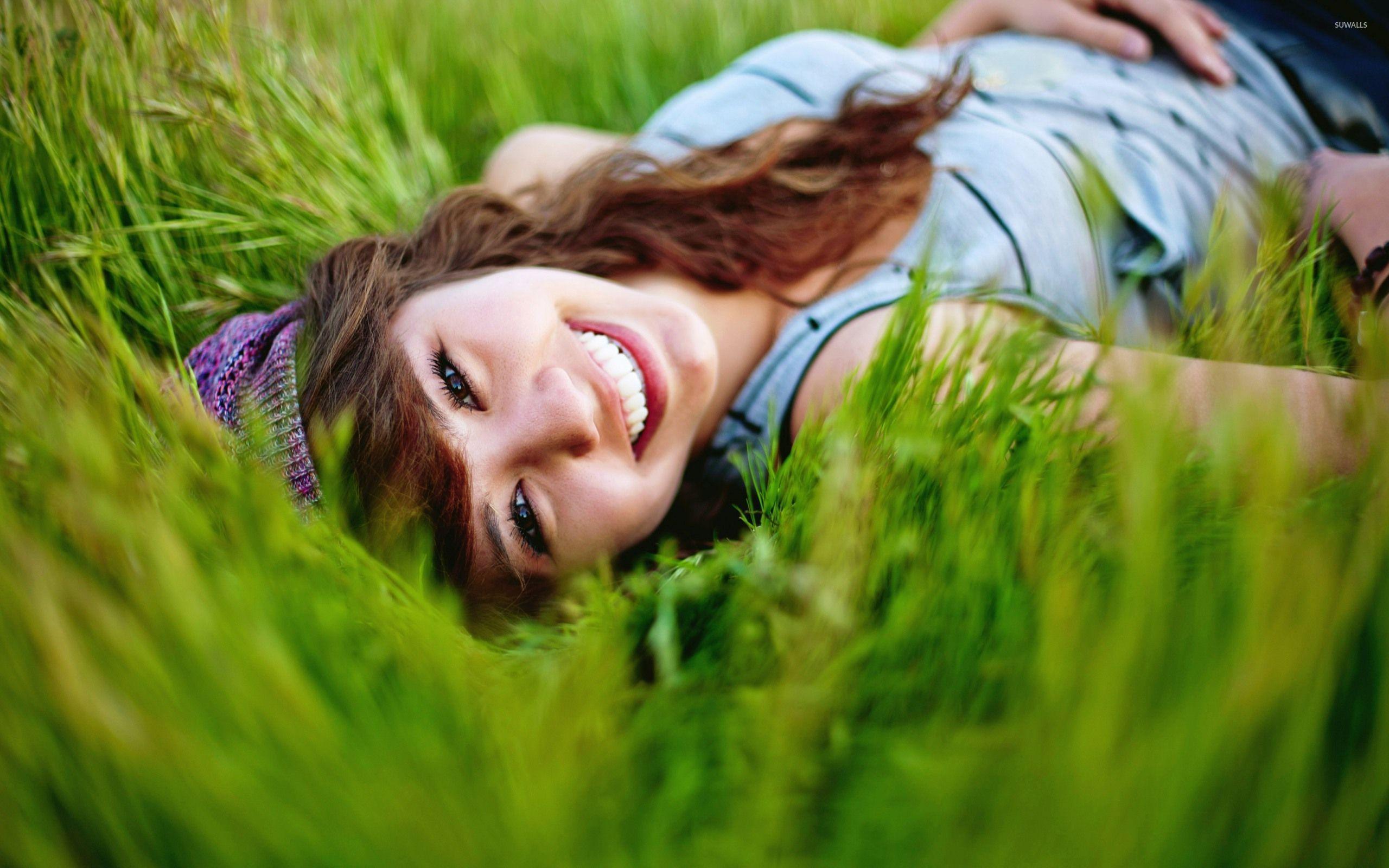 Happy girl in the grass wallpaper wallpaper