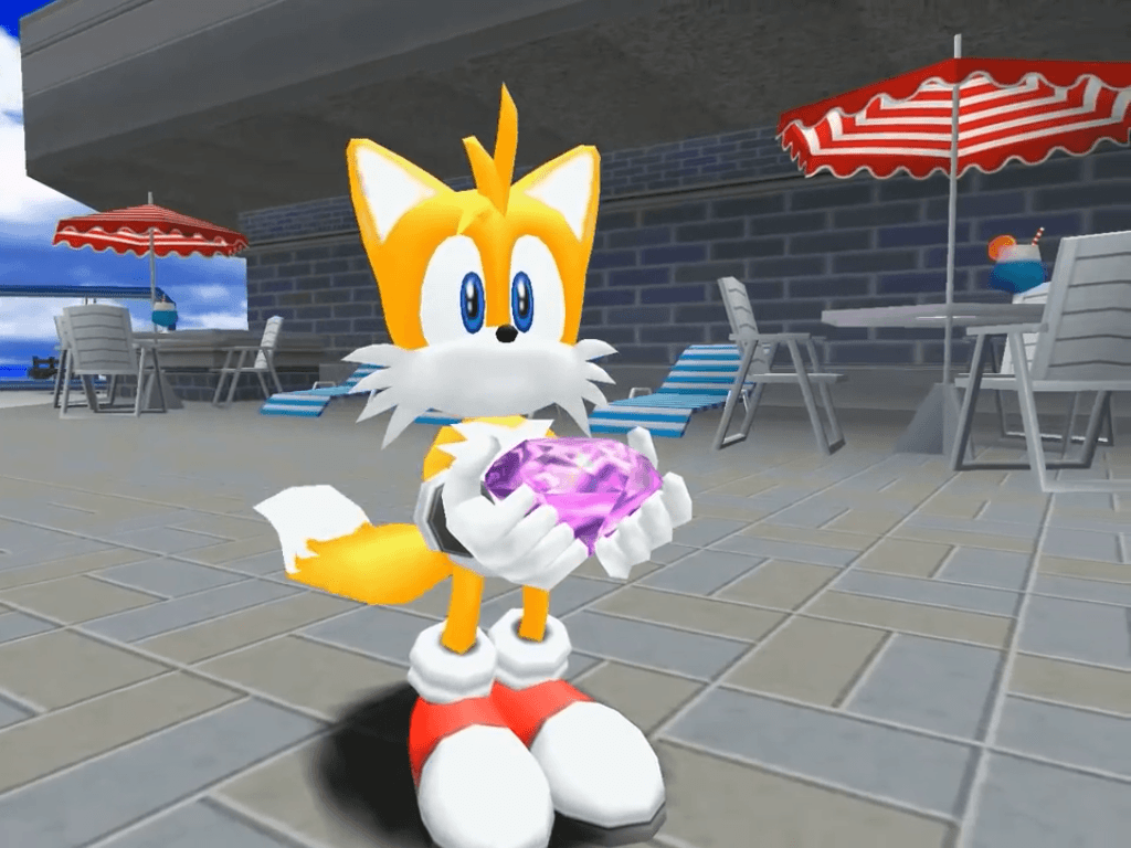 Tails showing his Chaos Emerald.png. Sonic News Network