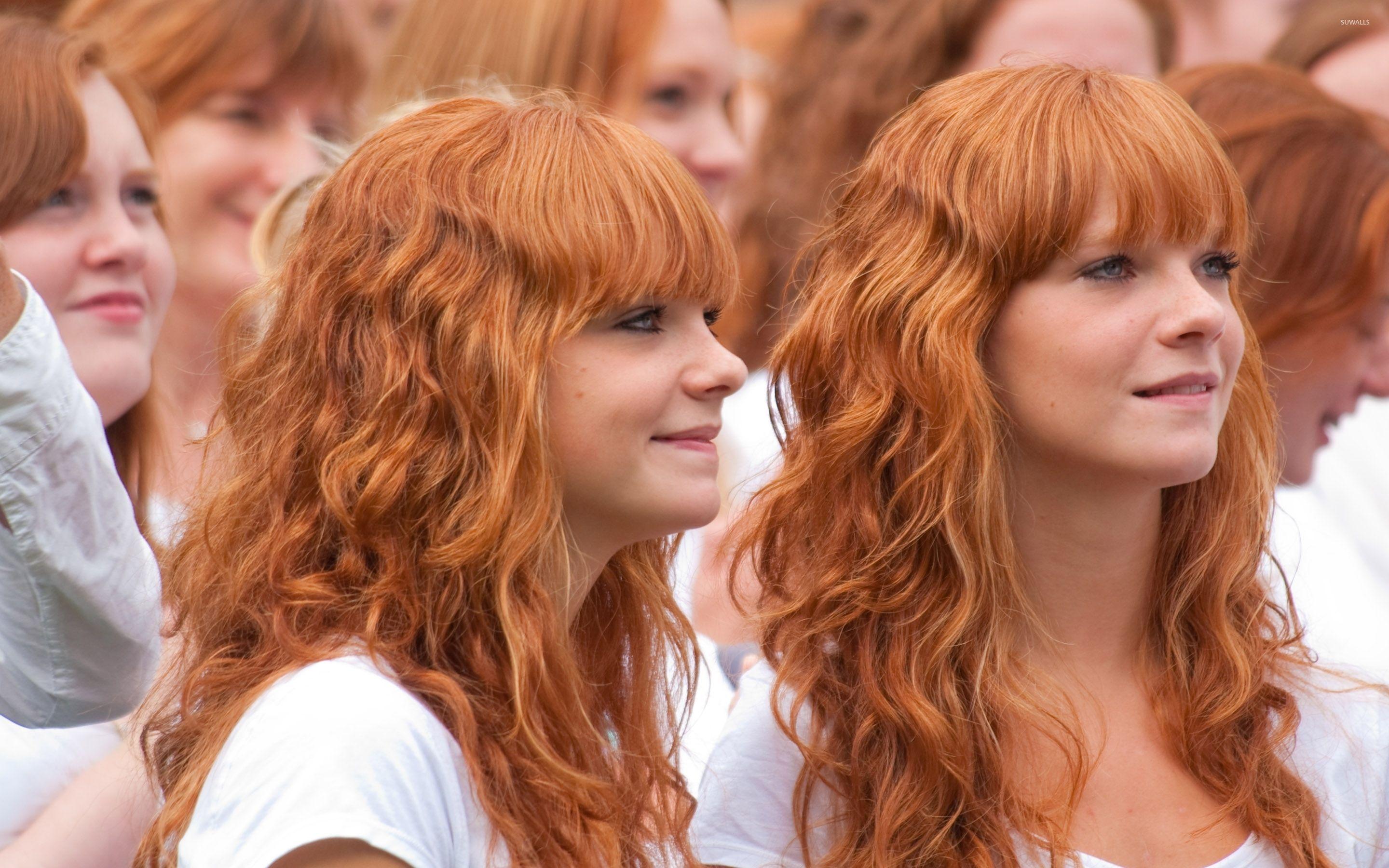 Identical redhead twins