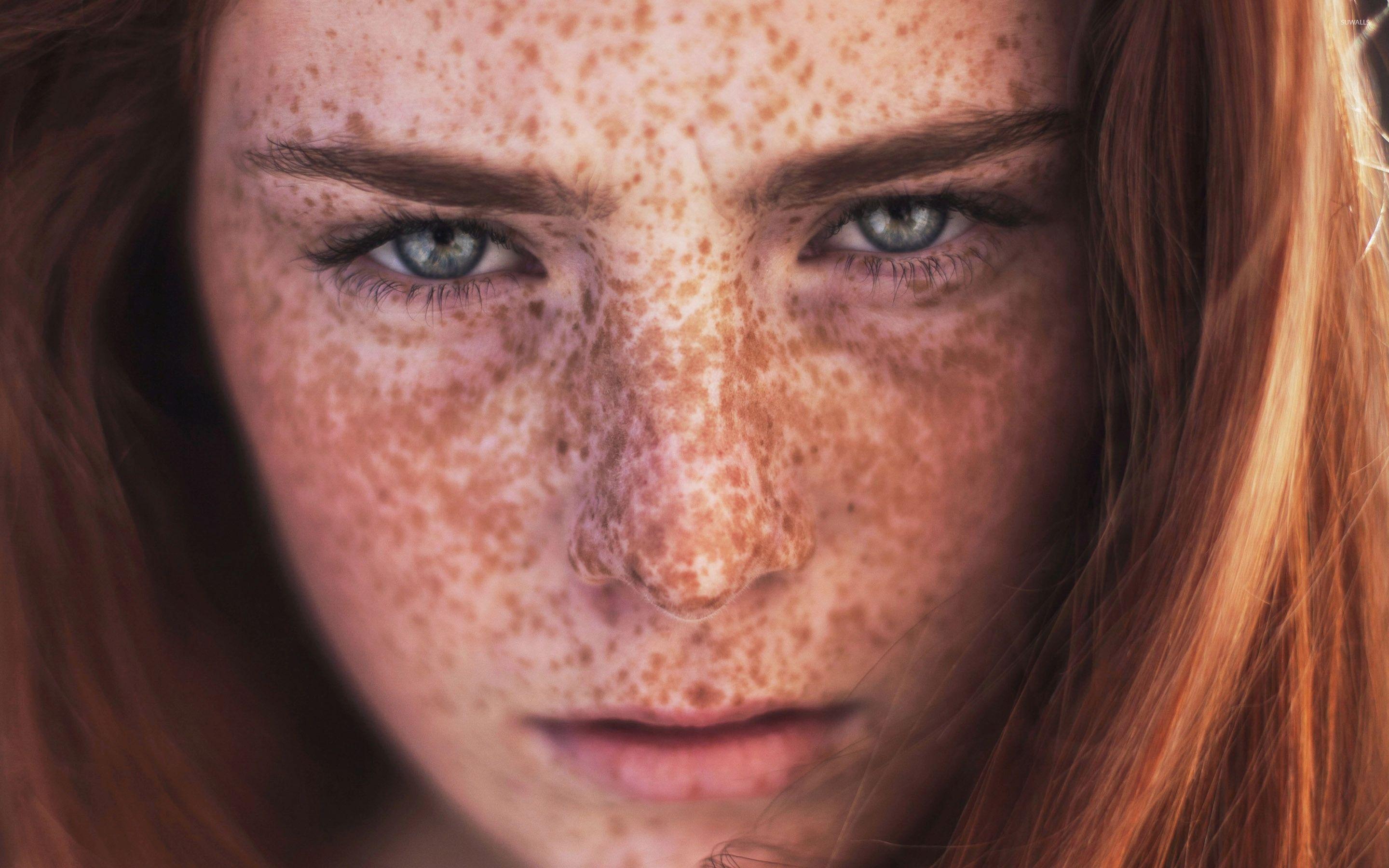 Redhead with freckles and blue eyes wallpaper wallpaper