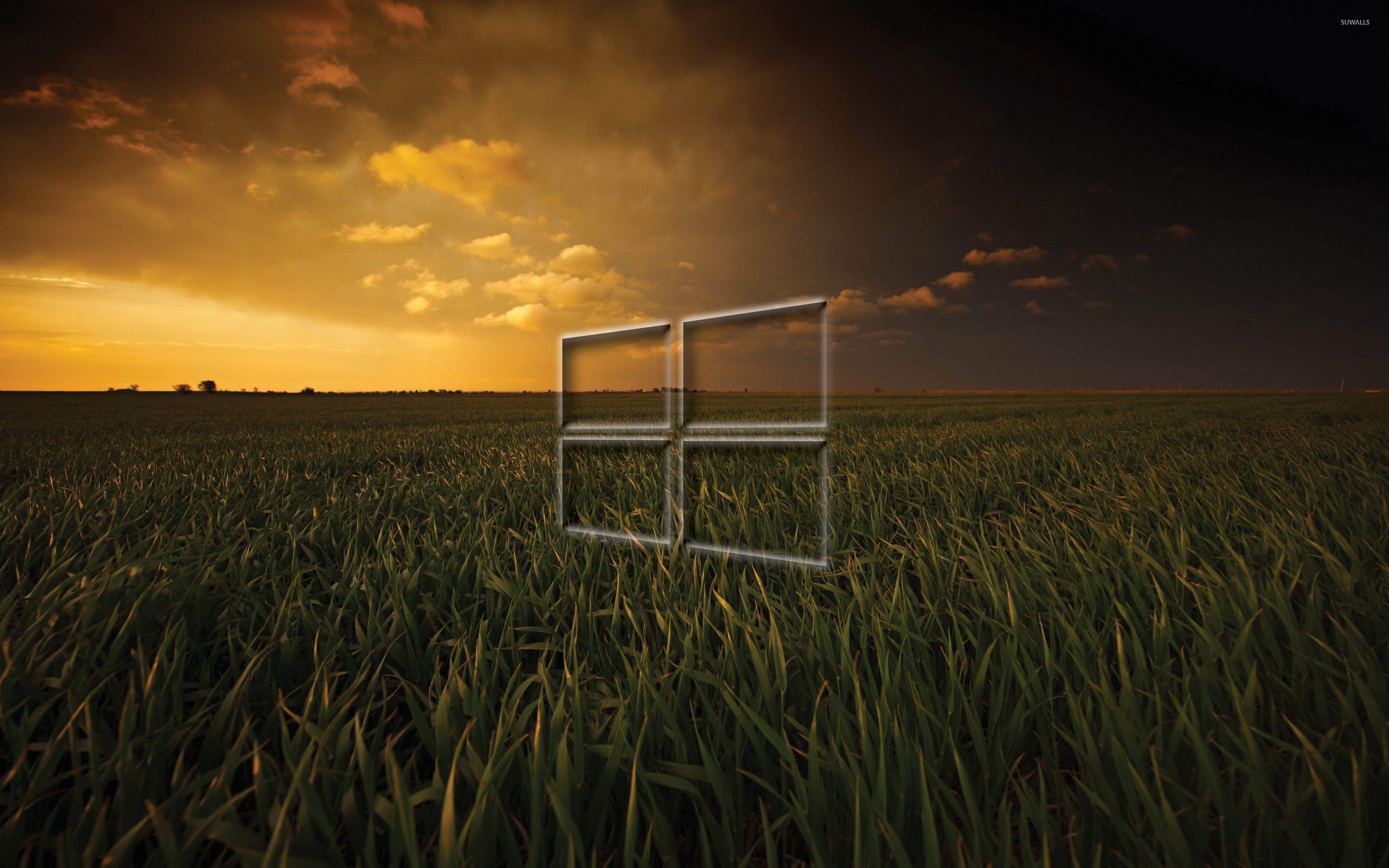 Windows 10 transparent logo on the dark field wallpaper