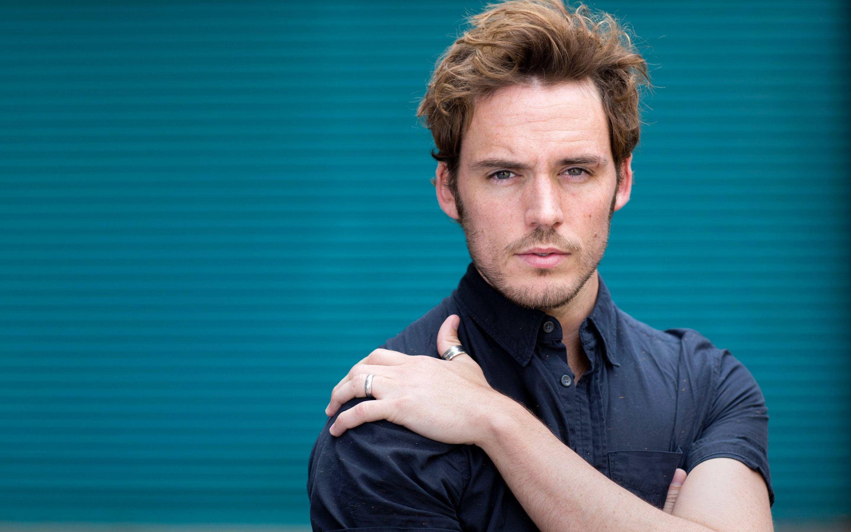 Download wallpaper Sam Claflin, English actor, portrait, blue shirt