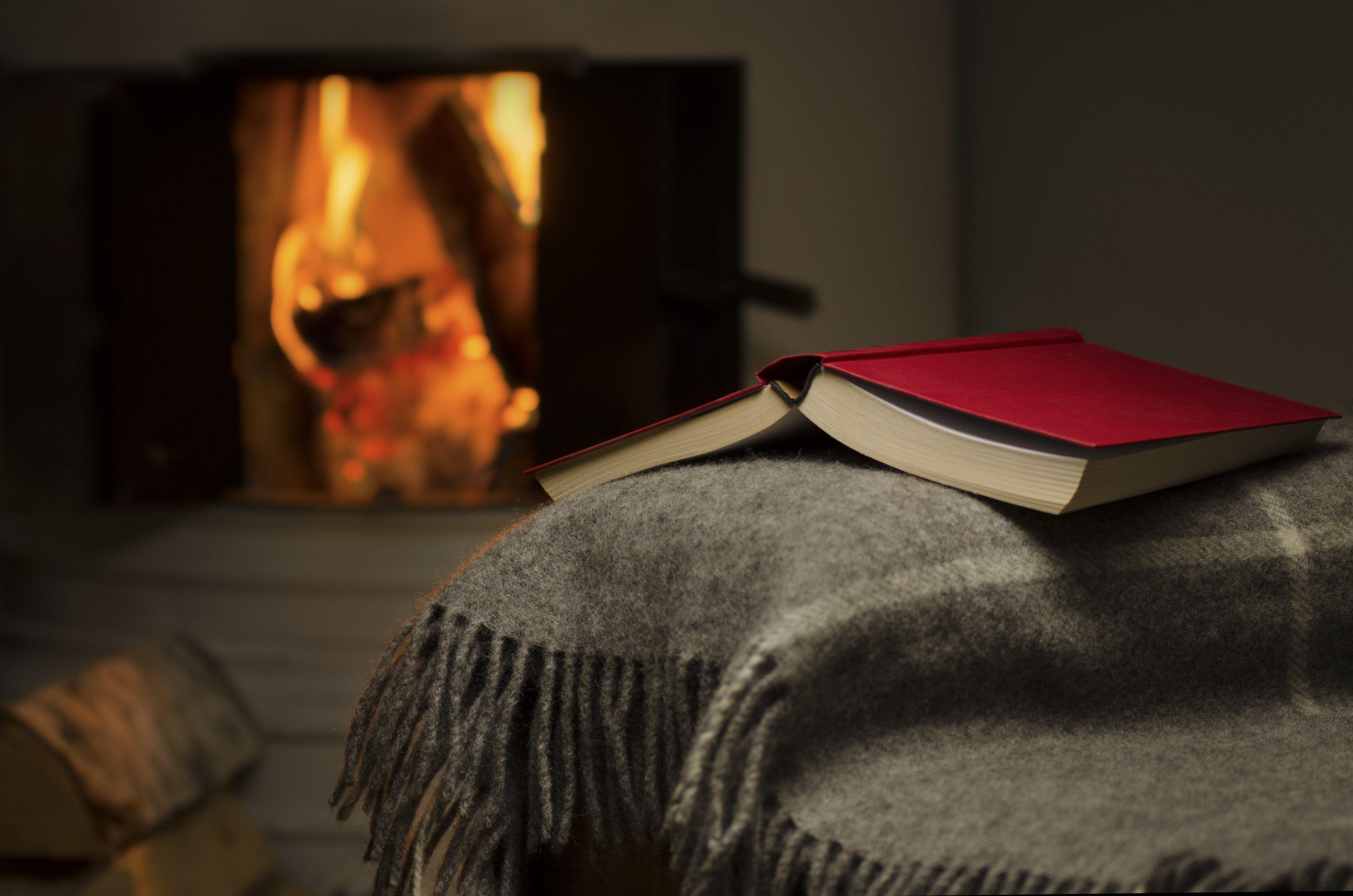 Fireplace a book a fire blanket mood bokeh wallpaperx2872