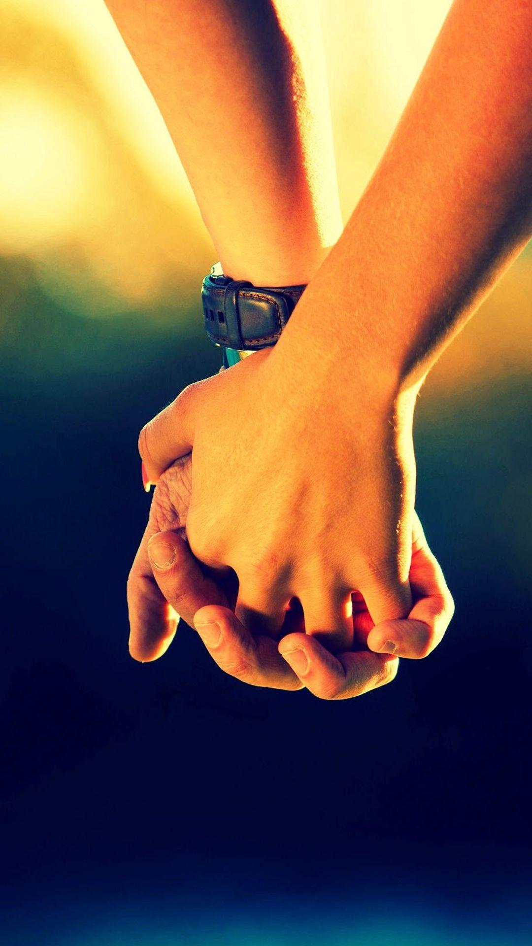 Couple Holding Hands iPhone 8 Wallpaper. Couple holding hands