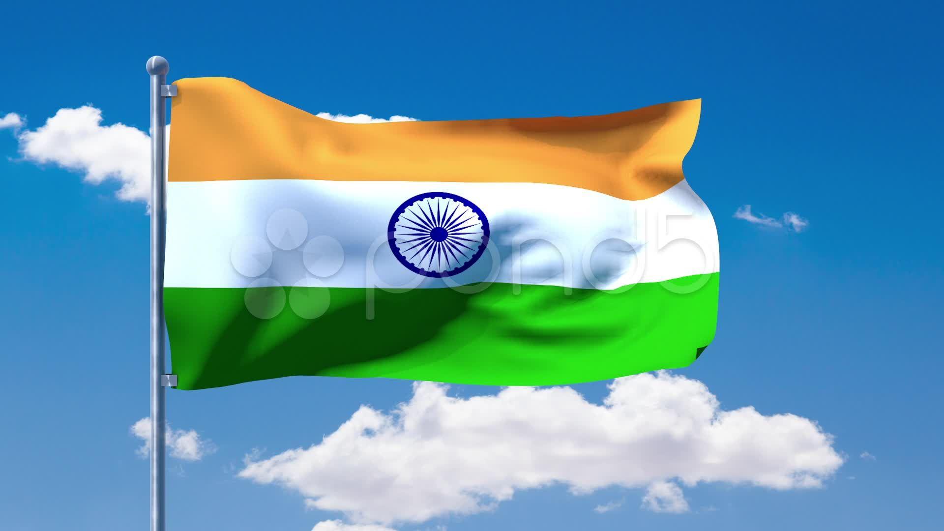 Video: Indian flag waving over a blue cloudy sky