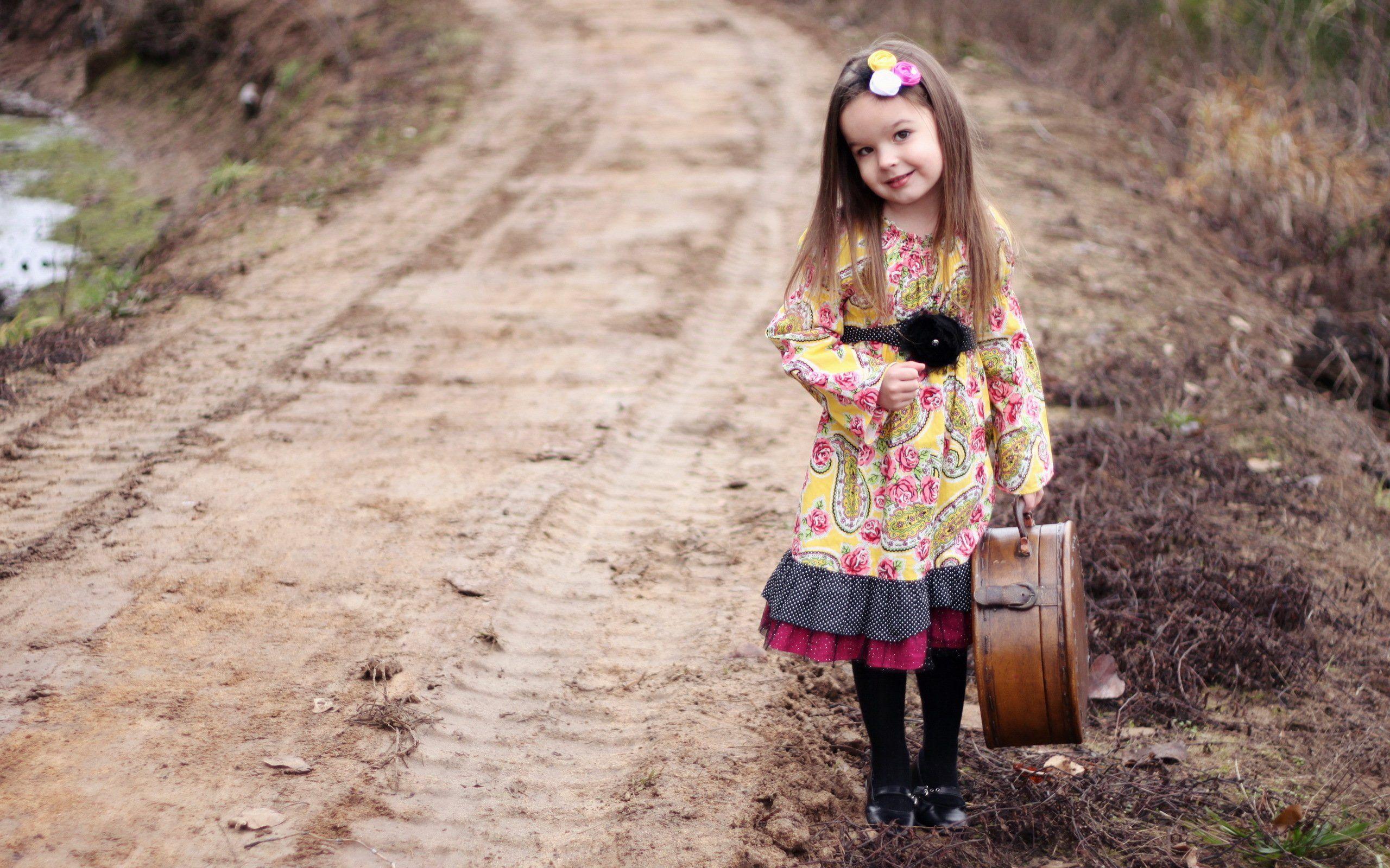 Girl a suitcase the road the mood cute child children travel