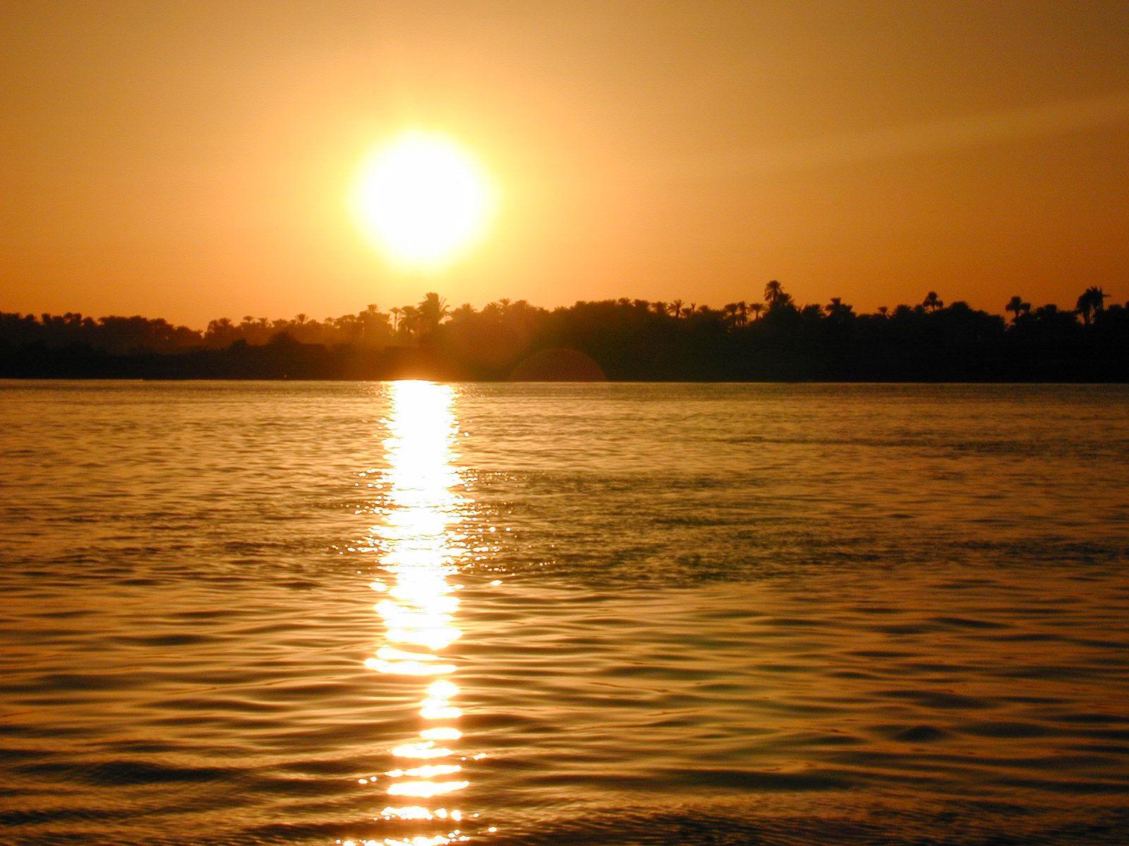 River's Edge: In this photo: Sun sets over the Nile River, which