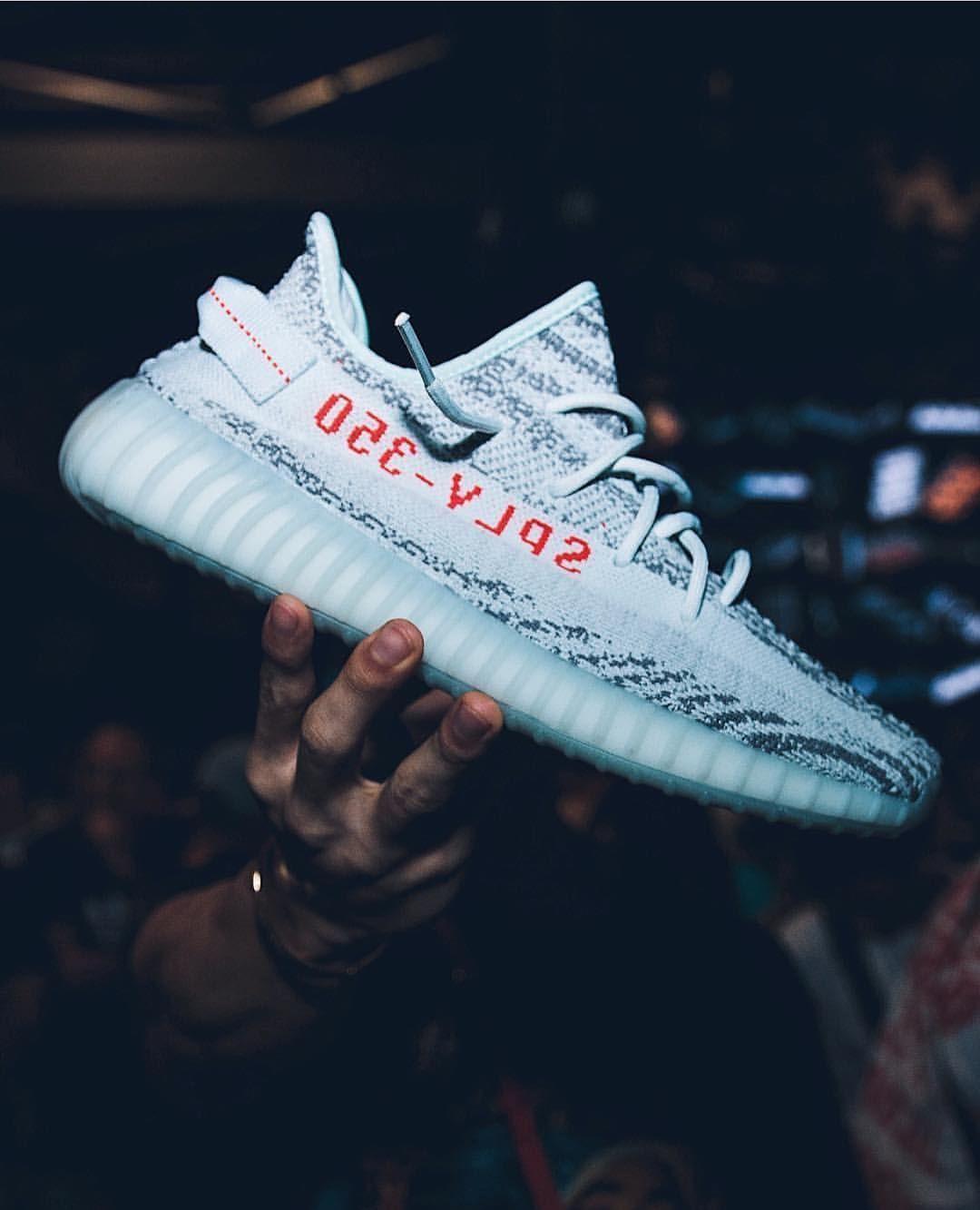 white and blue yeezys