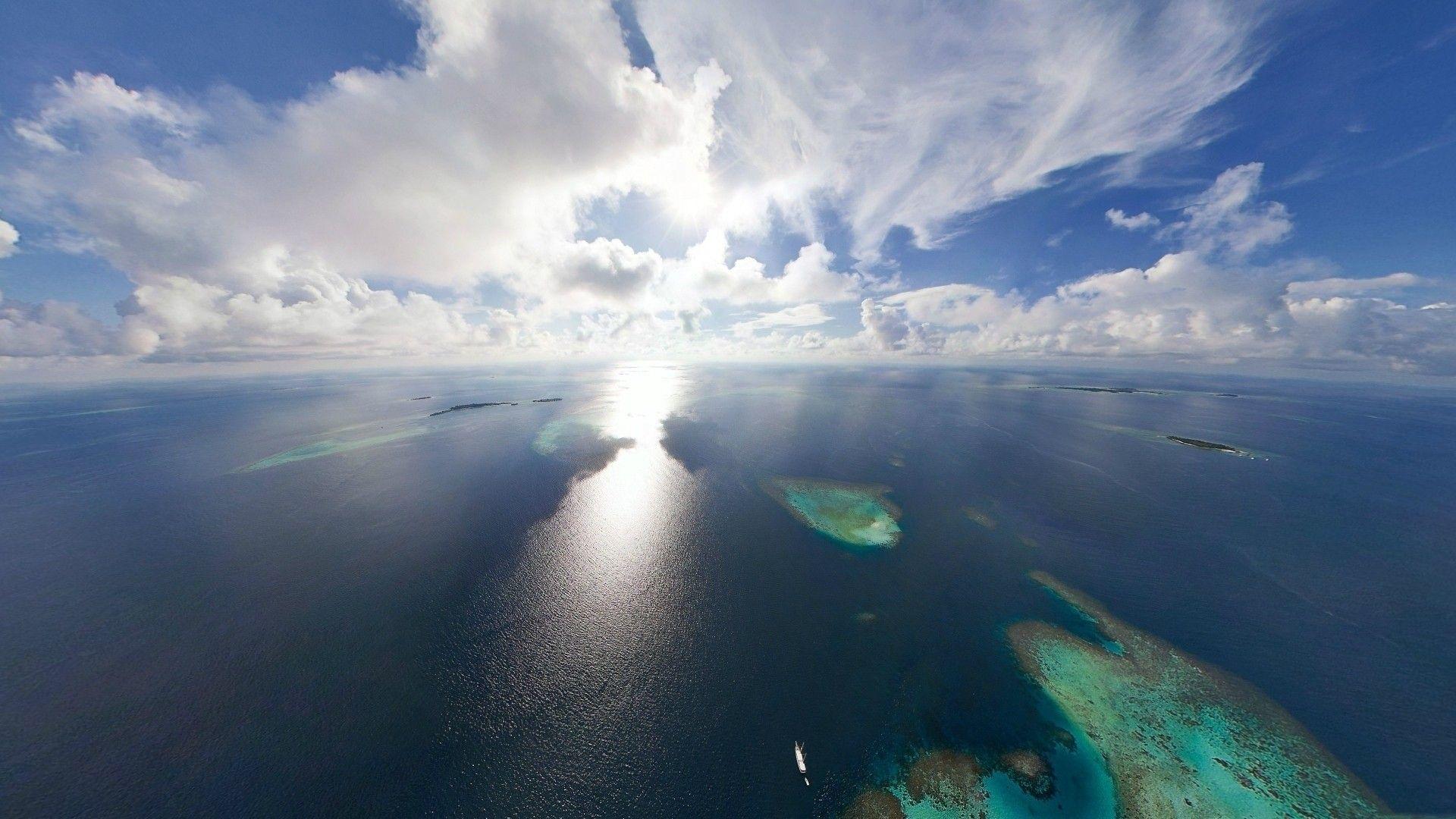 Oceans: Land Wondrous Clouds Islands Light Ocean Water View Movement