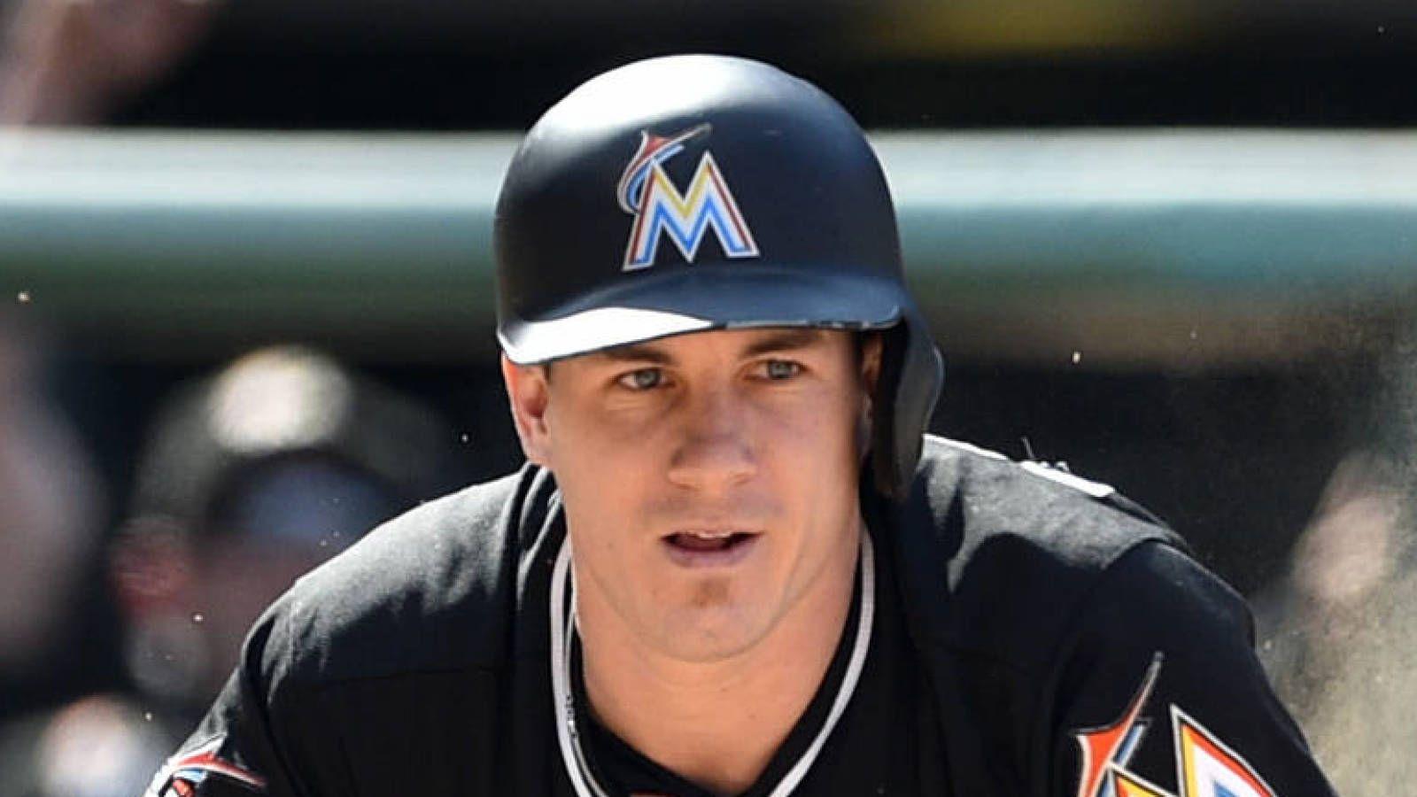 Report: Marlins 'reluctant' to trade Christian Yelich, JT Realmuto