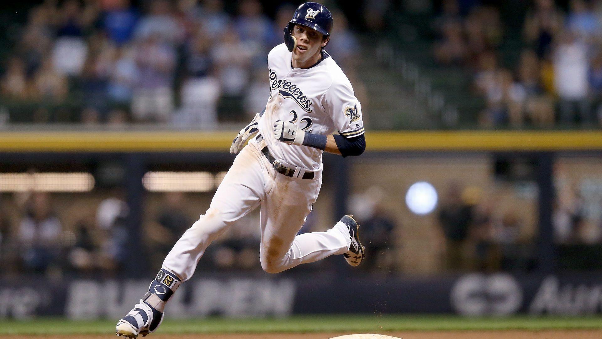 Brewers' Christian Yelich active Monday after taking pitch to elbow