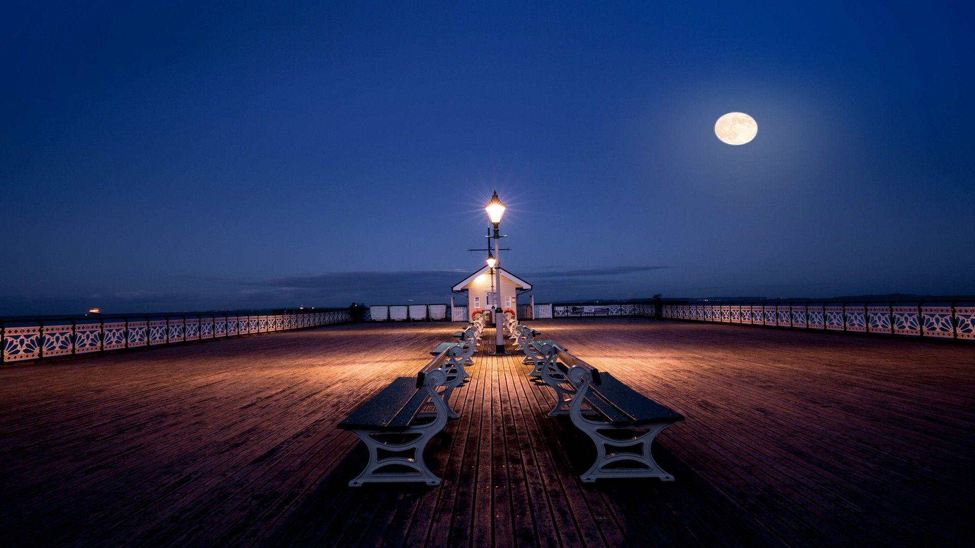 sand beach night pier wallpaper and background