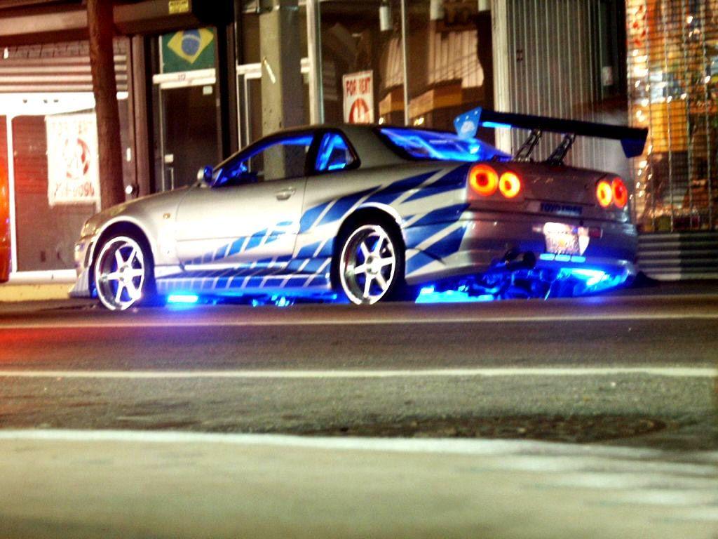 Fast and Furious, love the blue lighting. Nissan gtr skyline, Street racing cars, Nissan skyline gtr r34