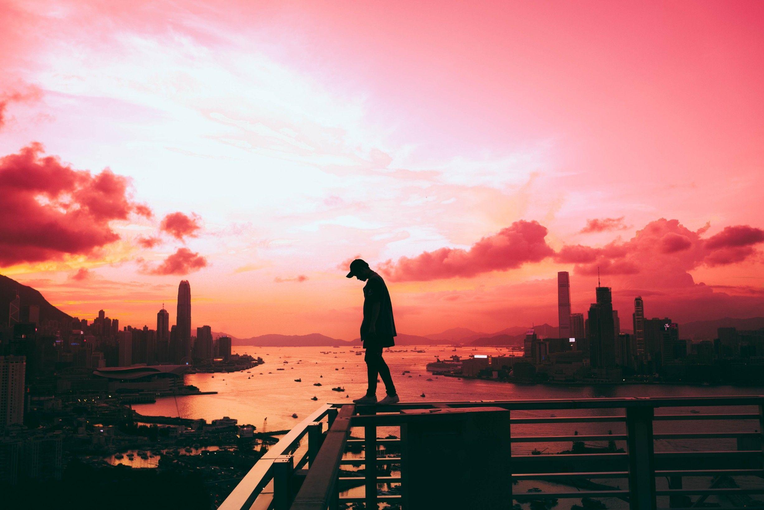 Download 2454x1637 Standing On The Edge, Man, Sunset, City