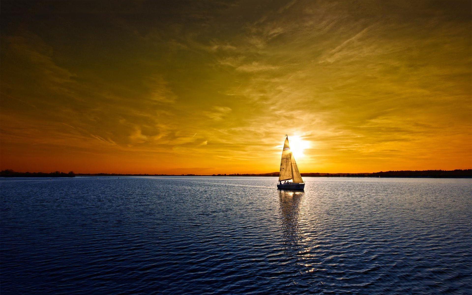 Sailboat lake sunset
