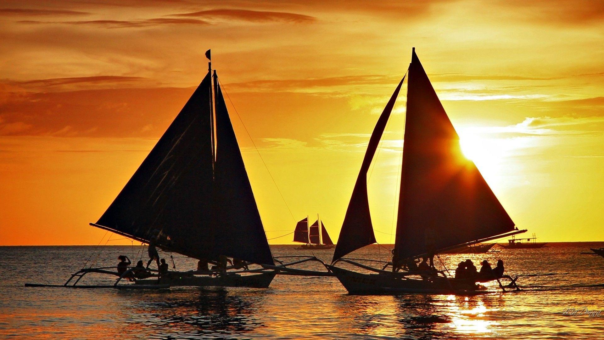 Sunsets: Clouds Sky Boats Sail Sea Oriental Sun Sunset Sailing