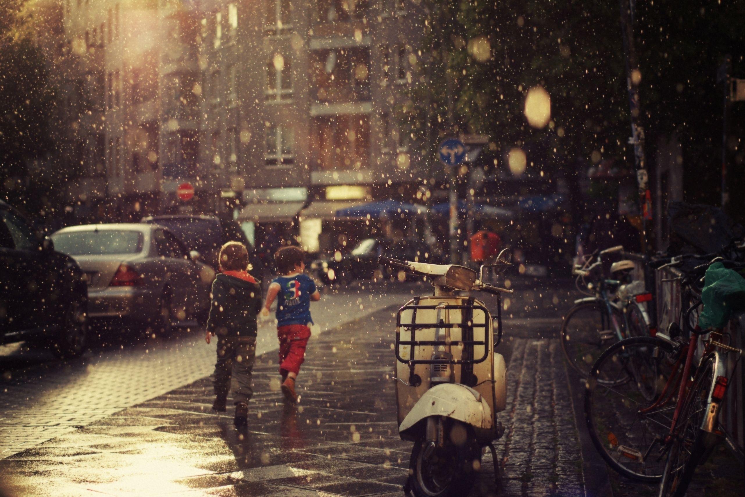 Download wallpaper 2563x1709 street, children, running, rain, city