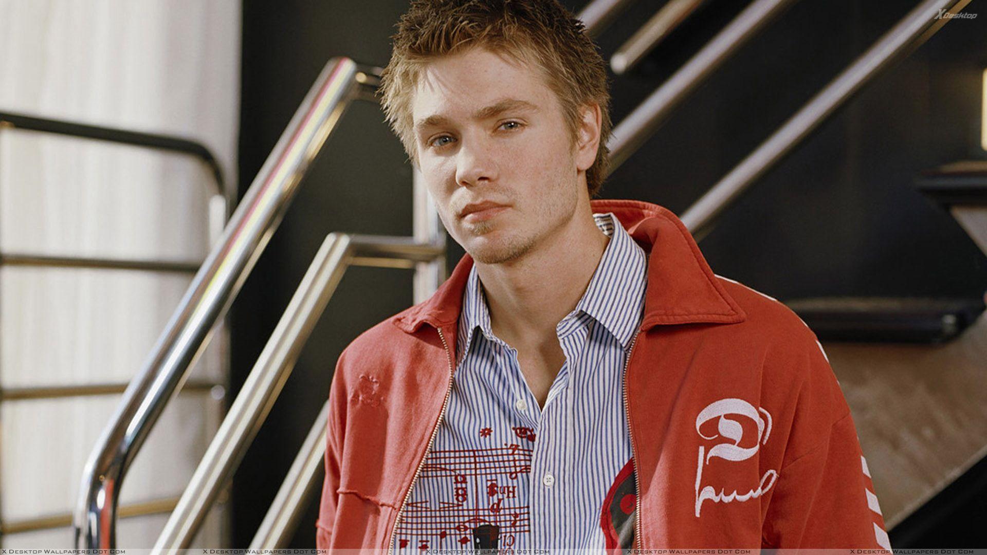 Chad Michael Murray Looking Front In Red Jacket Wallpaper