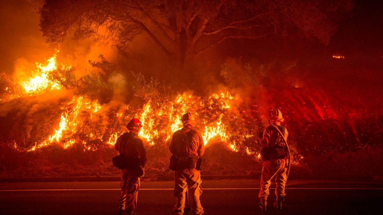 Firefighters battle a wildfire near Mariposa, California. Climate