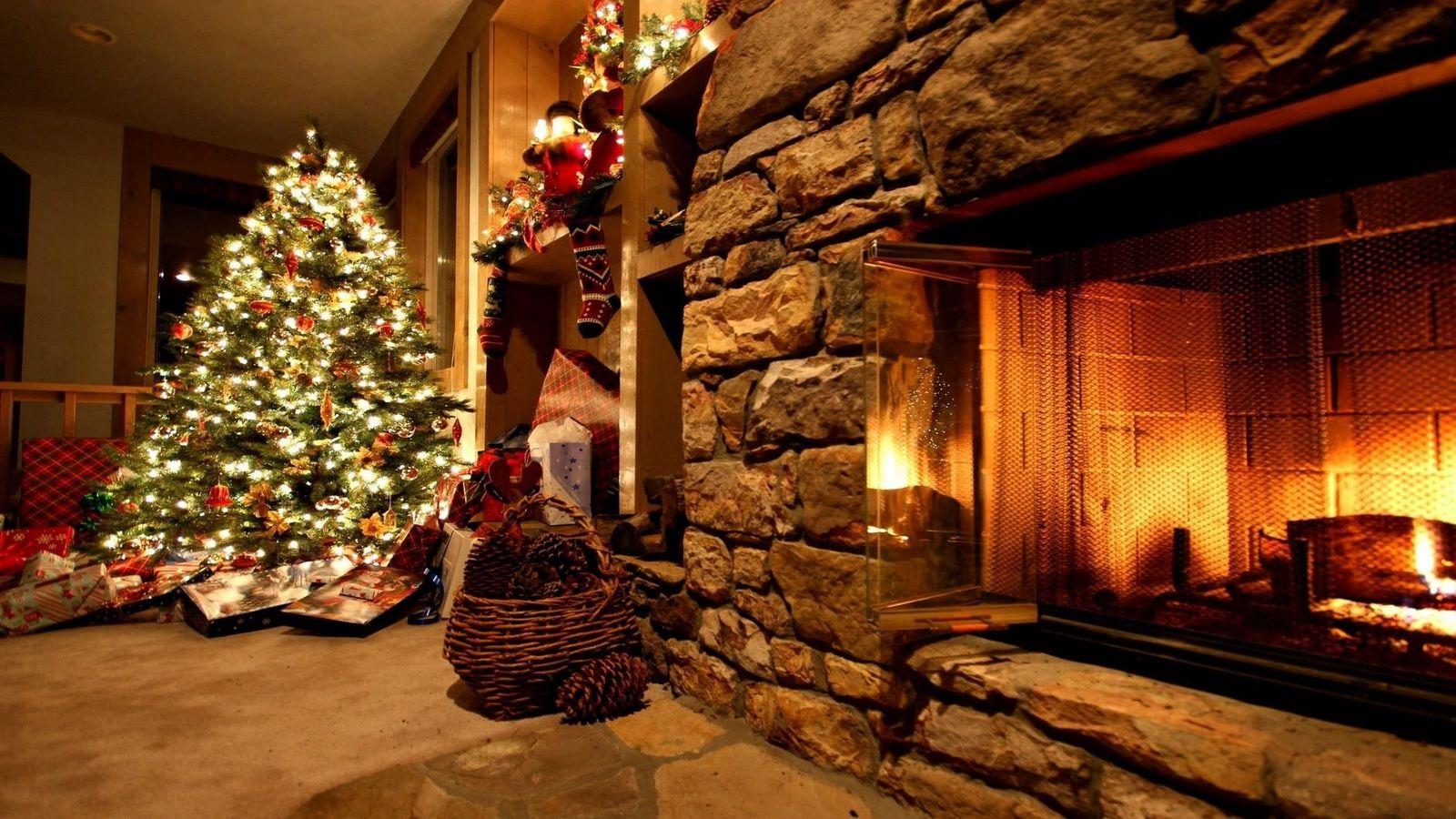 Download wallpaper 1600x900 christmas tree, ornaments, fireplace