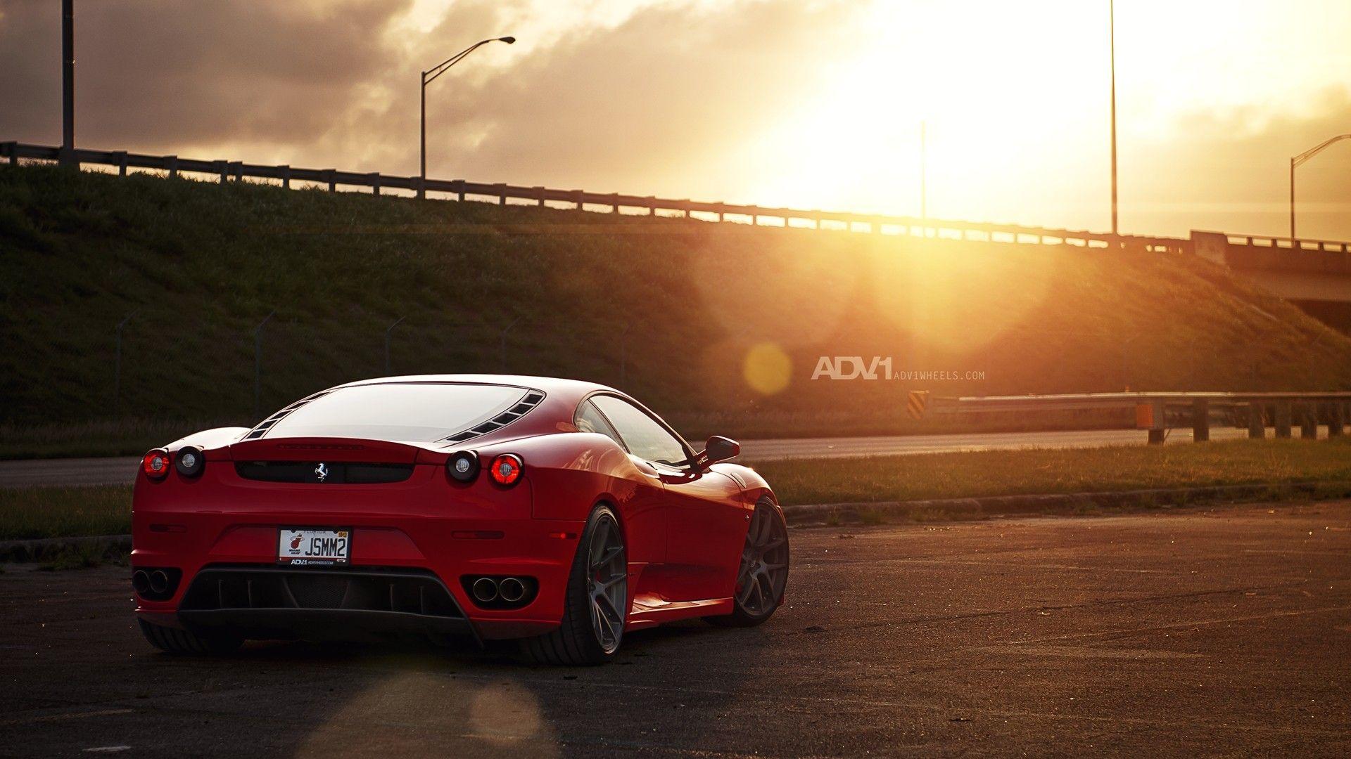 Red Ferrari ADV1 Parking Lot desktop PC and Mac wallpaper