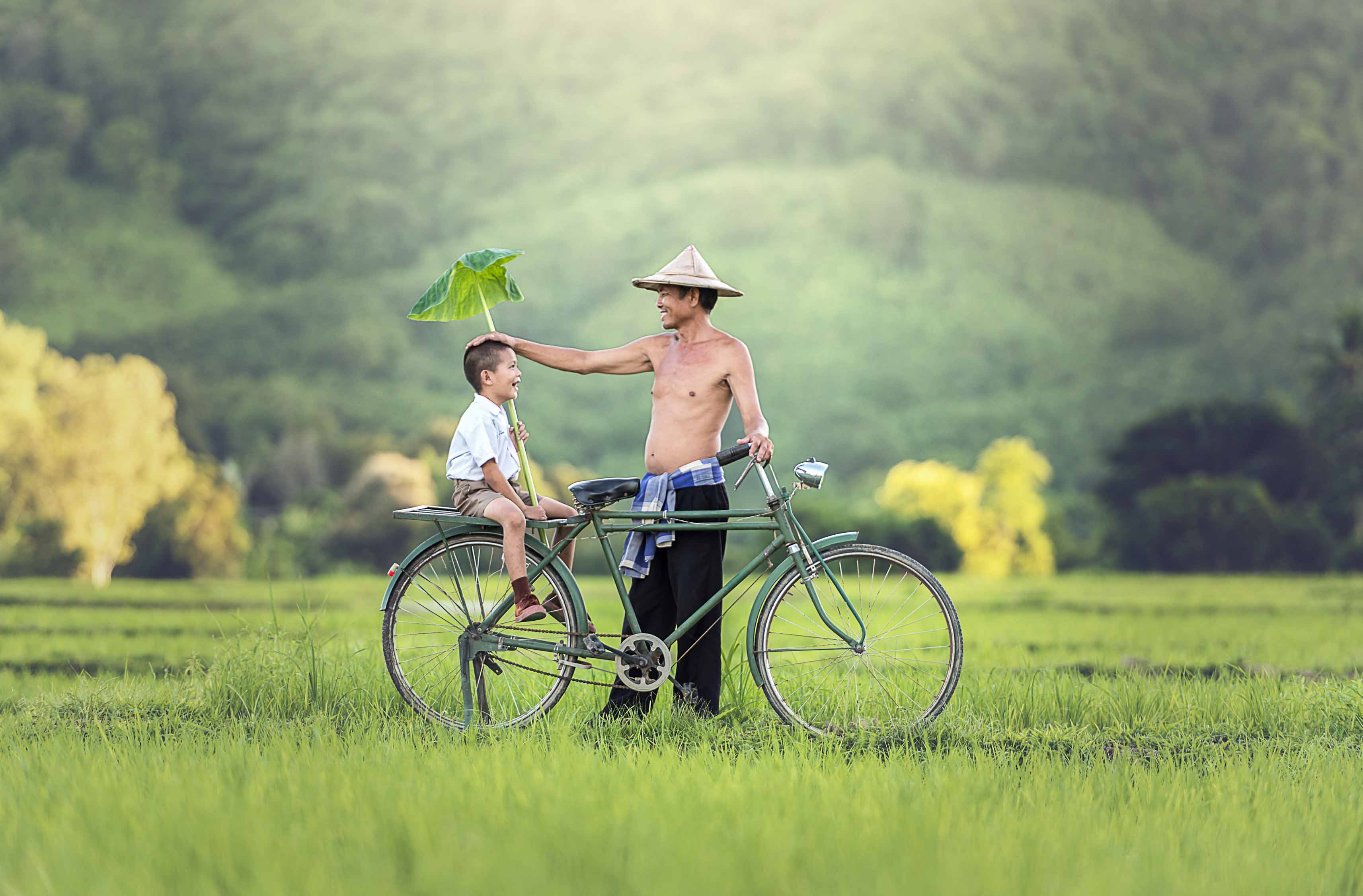 father and son with bicycle love wallpaper