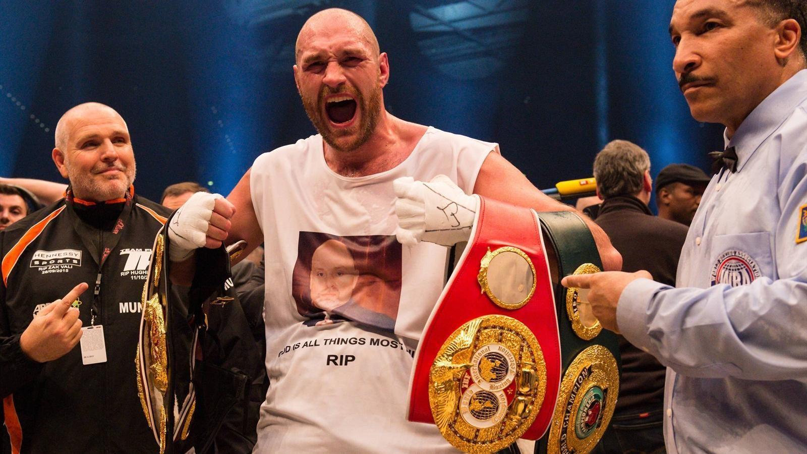 Tyson Fury celebrates world heavyweight title win with 000