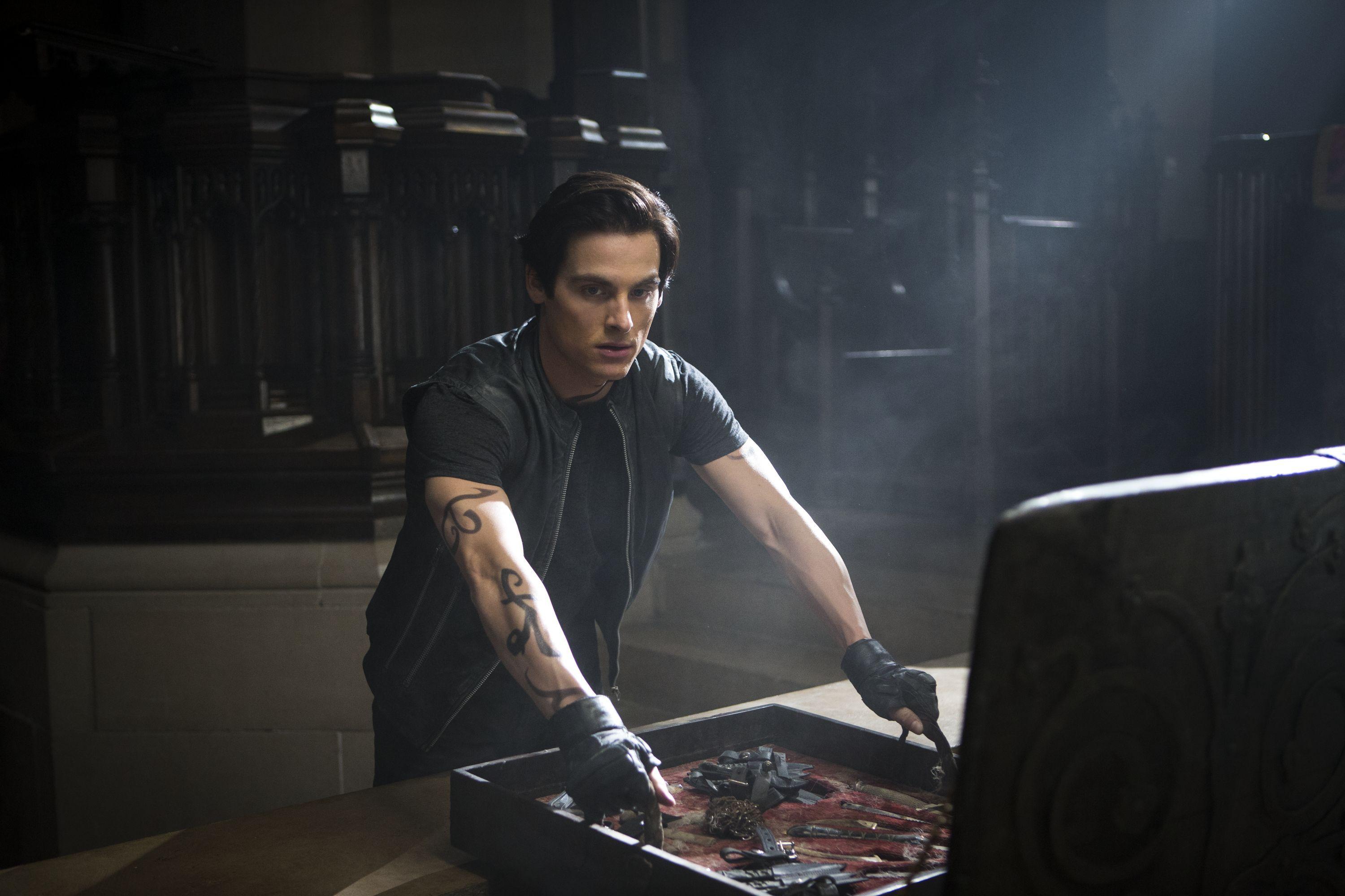 Alec (Kevin Zegers) weapons up in THE MORTAL INSTRUMENTS: CITY OF
