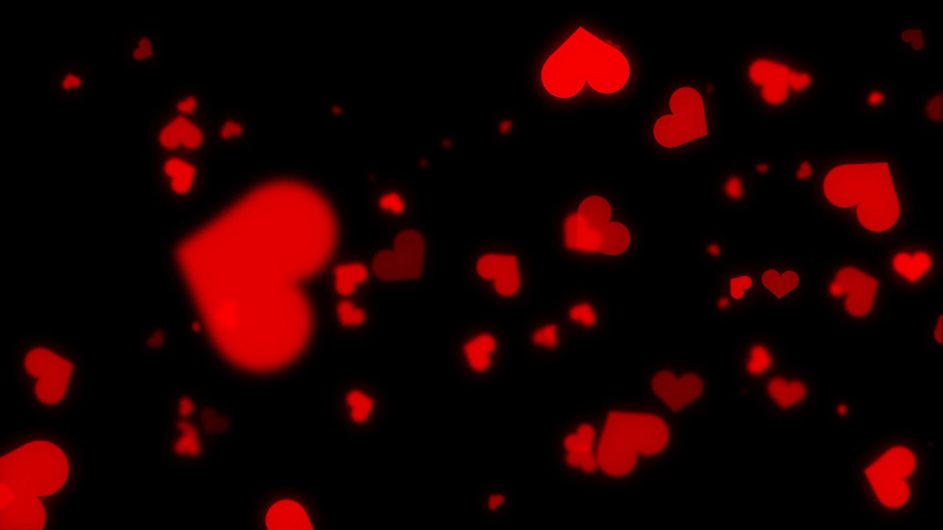 Red hearts on black backgrounds loop ~ Video Clip