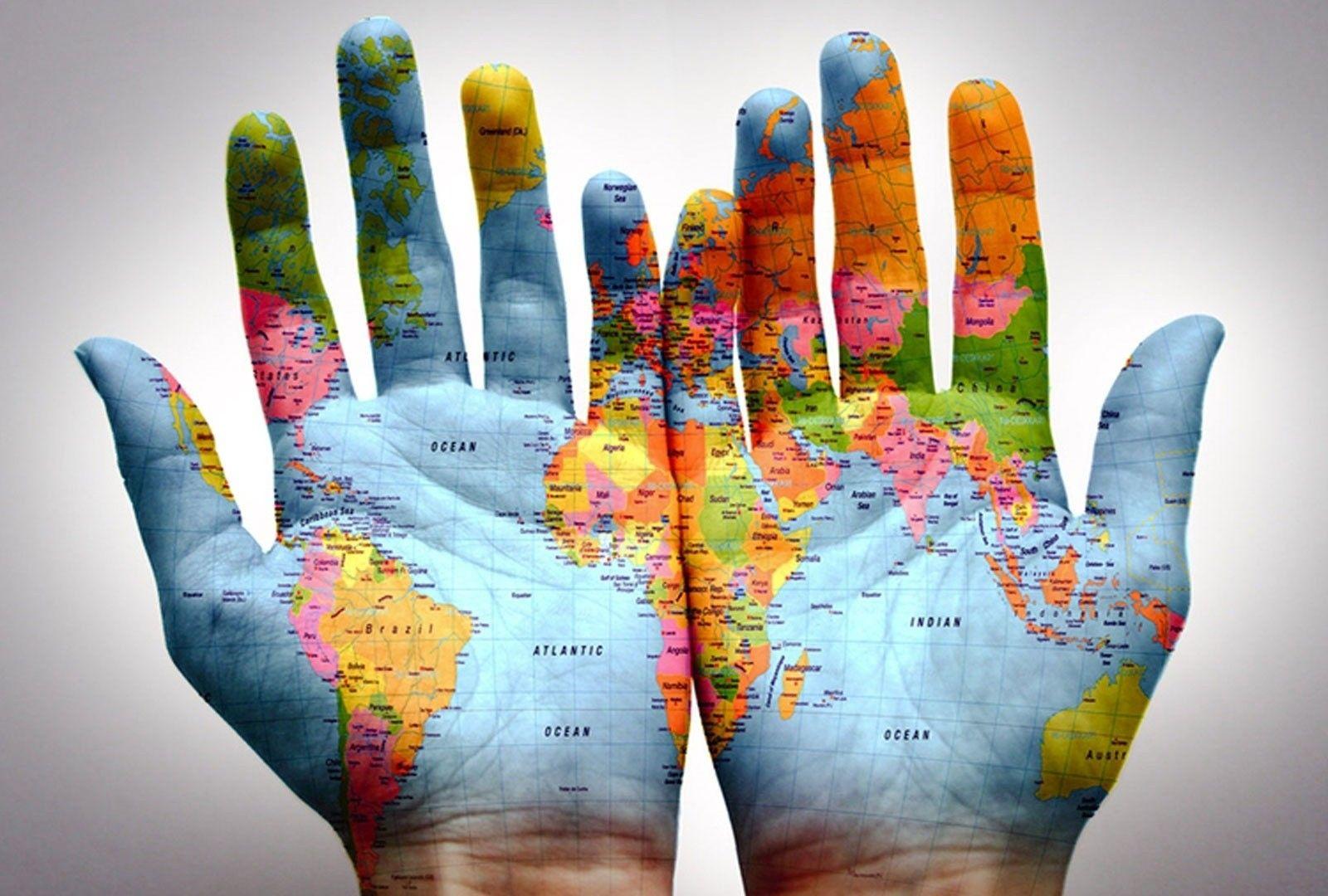 Map painted on hands HD Wallpaper
