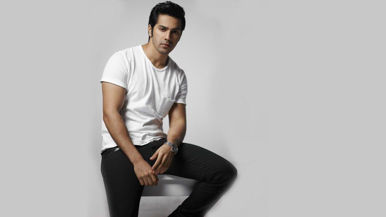 Download Varun Dhawan In White T Shirt & Black Jeans Wallpaper HD